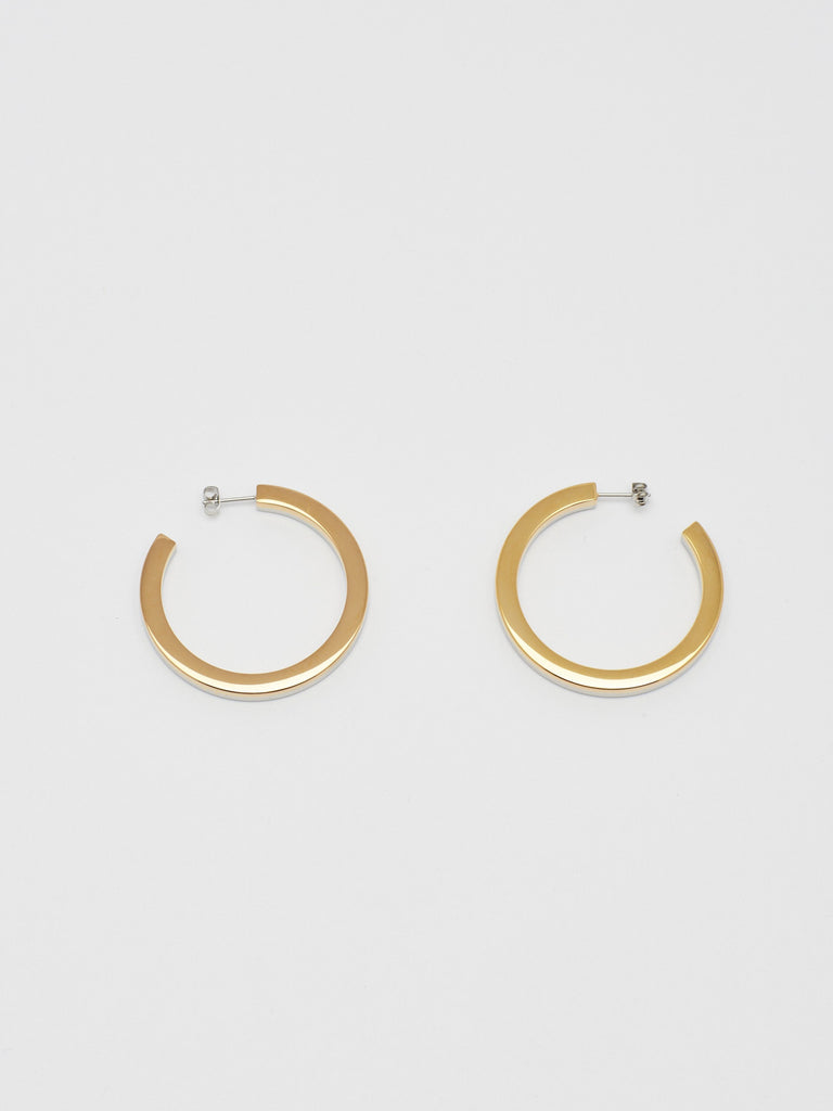 Flat lay view Two Tone Flat Hollow Hoops Earrings Bagatiba