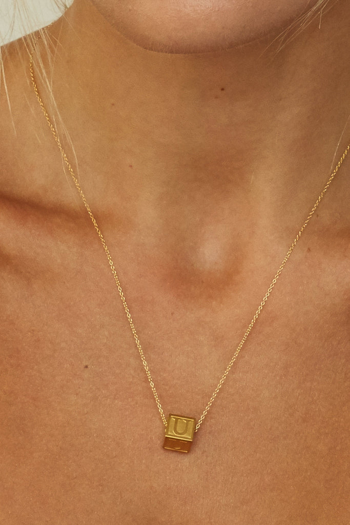 Cropped view on model "U" Letter Block letters on 16" + 2" Chain  Bagatiba