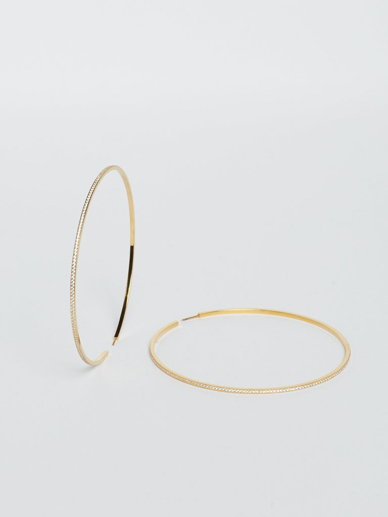 Close flat lay view of the XL Oversized Diamond Hoops Earrings Bagatiba