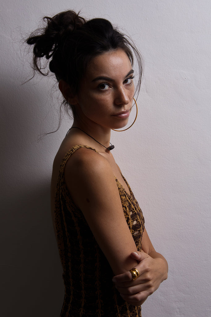 Model wearing the XL Oversized Simple Gold Hoops Earring Bagatiba