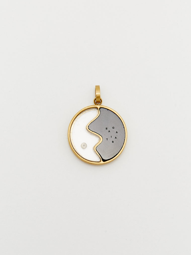 Detail flat lay of the reverse side of the Yin Yang Glass Necklace Necklace bagatiba