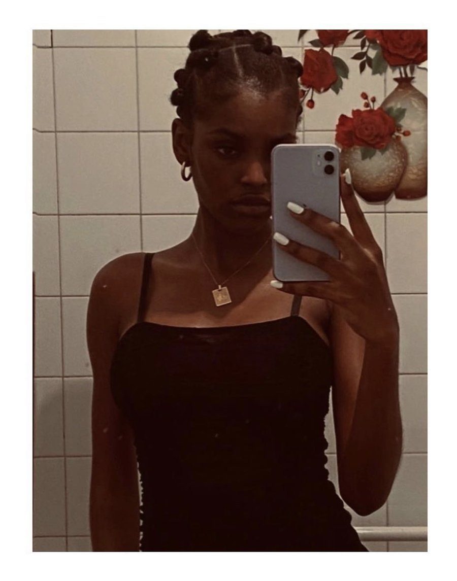 AMILNA ESTEVAO IN THE MINI HOLLOW HOOPS AND ZODIAC NECKLACE