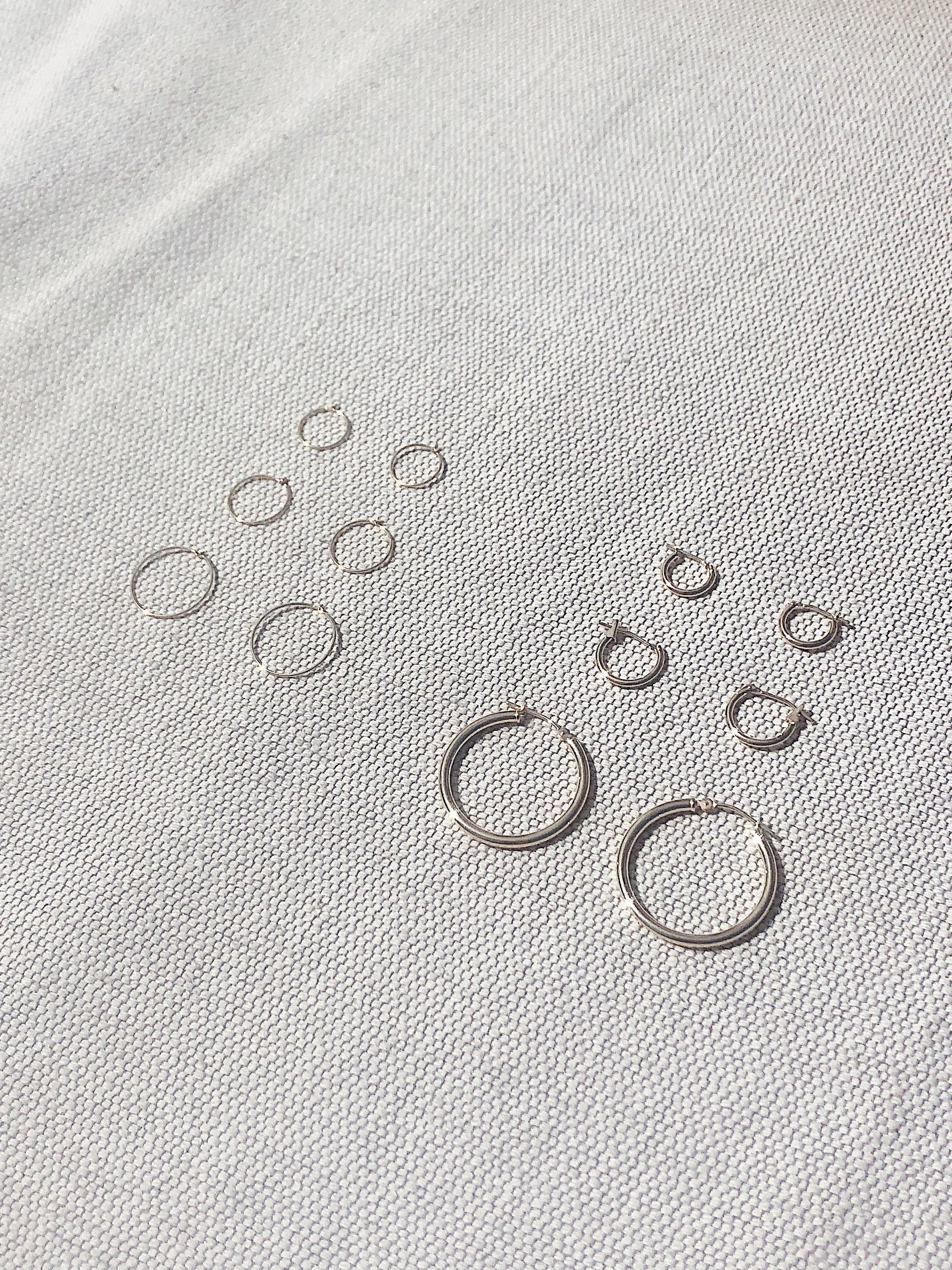 Full view 14K 301 Mini Hoops Earrings with 1M, 2M, 3M, 14k 302, 303 hoops for size comparison Bagatiba  