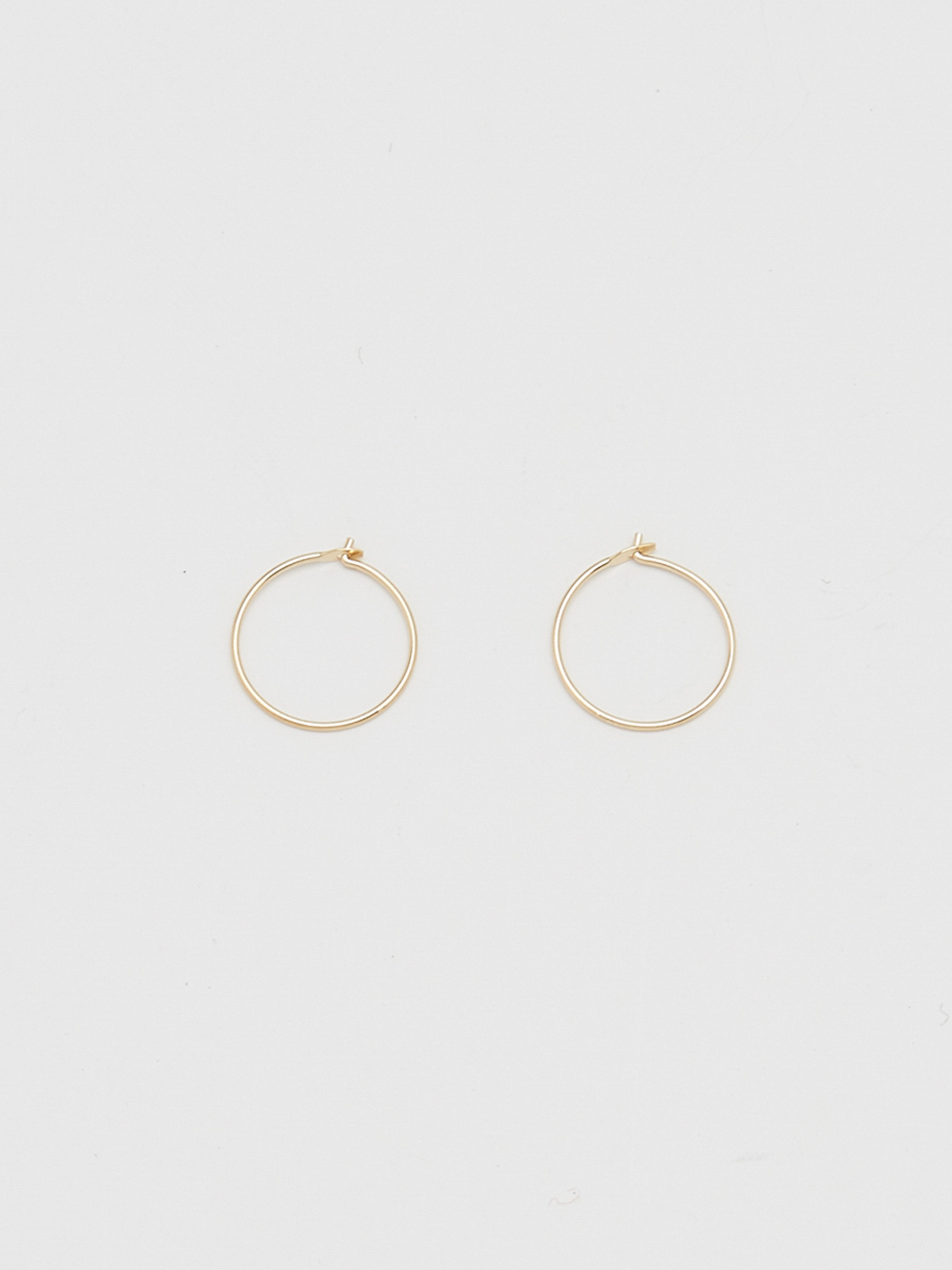 Close view flat lay 14K 301 Mini Hoops Earrings Bagatiba 