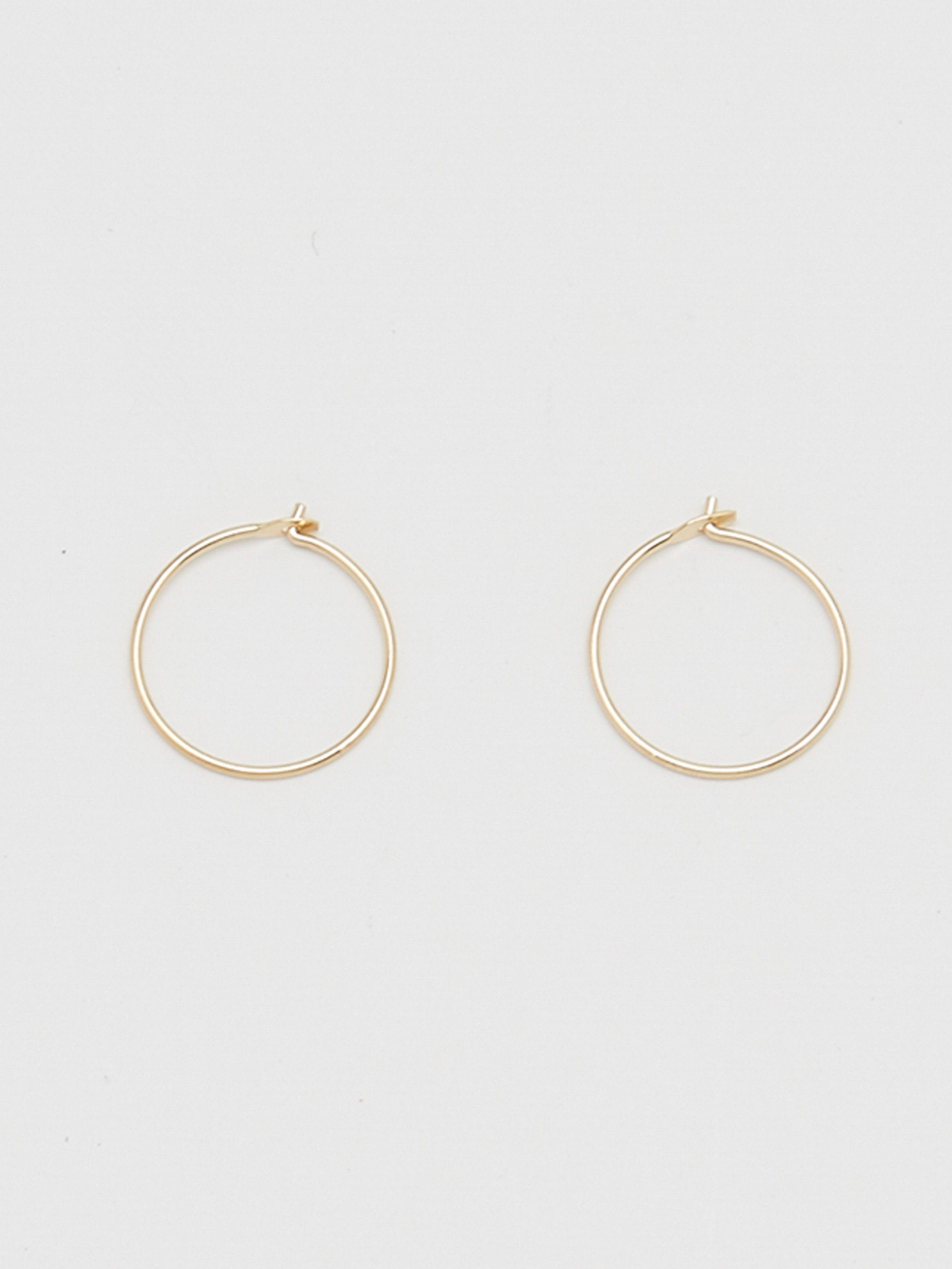 Close view flay lay of 14K 303 Mini Hoops Earrings Bagatiba 