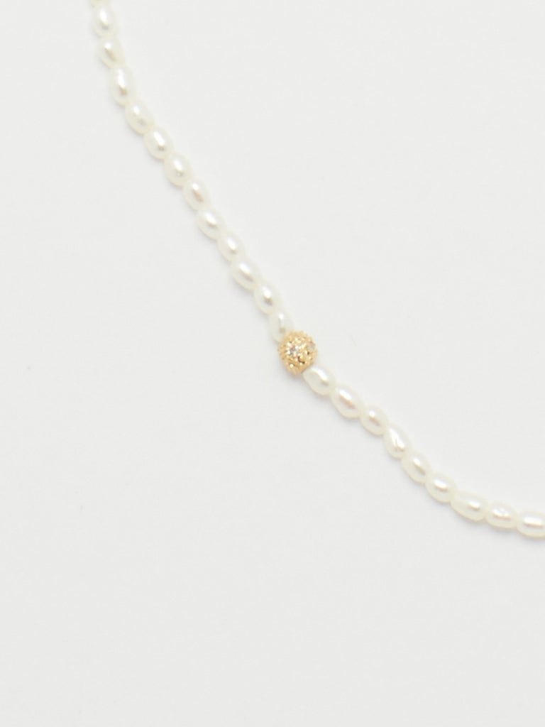 Close up flat lay 14K Diamond Pearl Necklace Necklace bagatiba 