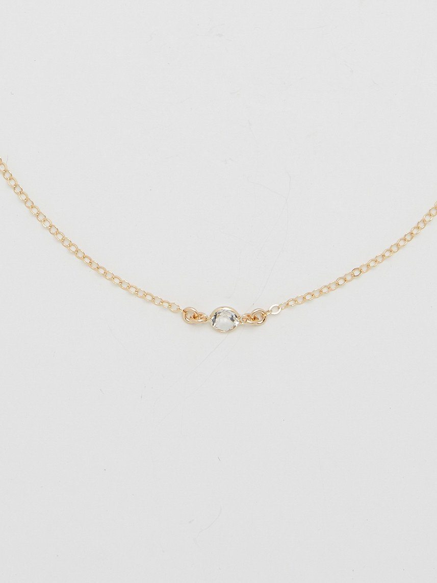 Cropped view flat lay of 14K Emma Choker Choker Bagatiba 