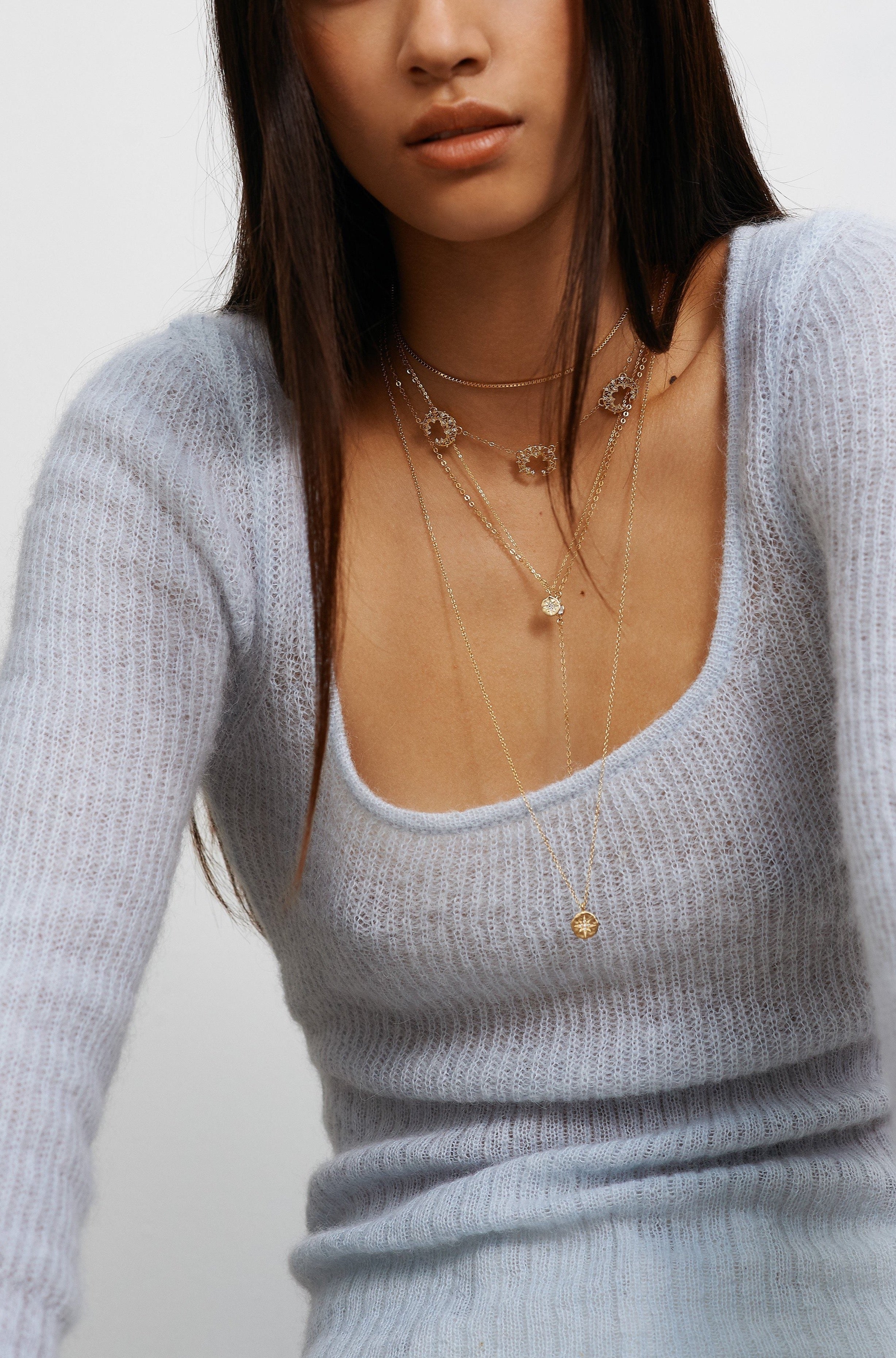 Model wearing multiple necklaces including 14K Emma Drop Necklace Necklace Bagatiba 