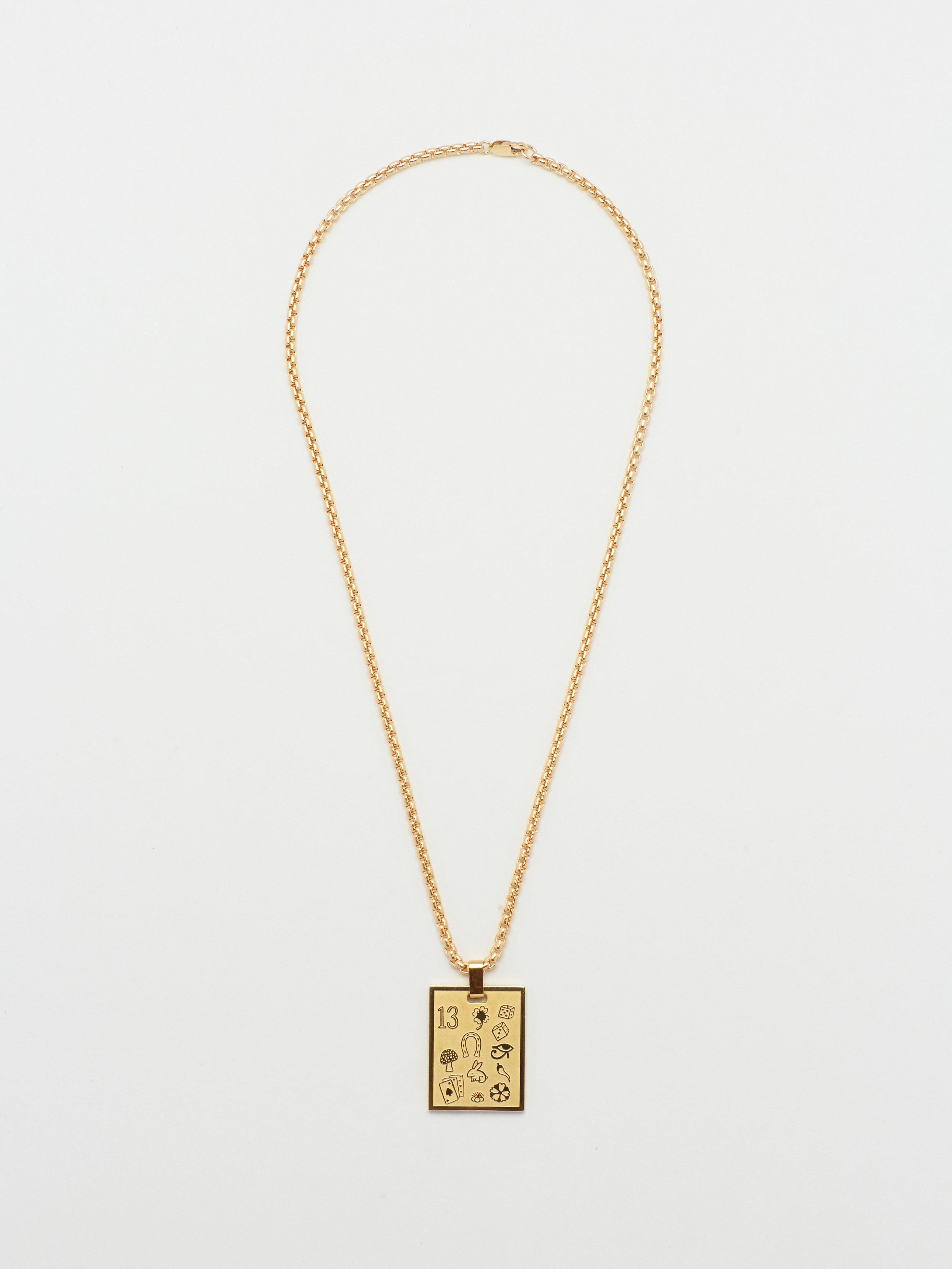 Full view flat lay of 16" Snake Chain Necklace with Lucky Charm  bagatiba 