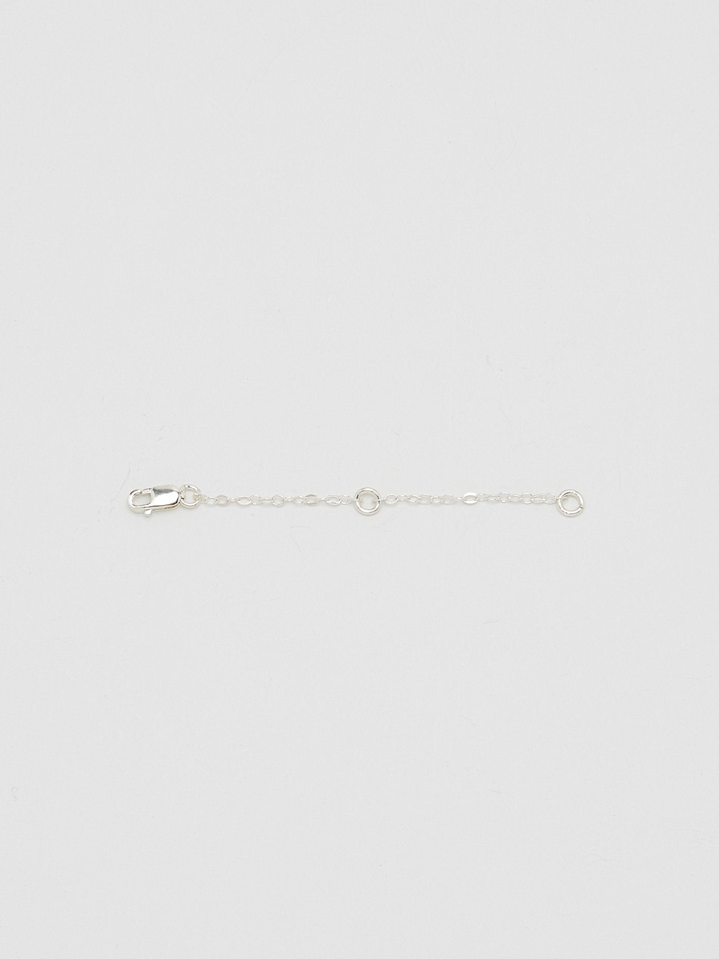 Full view flat lay of 2" Silver Extender Body Bagatiba 