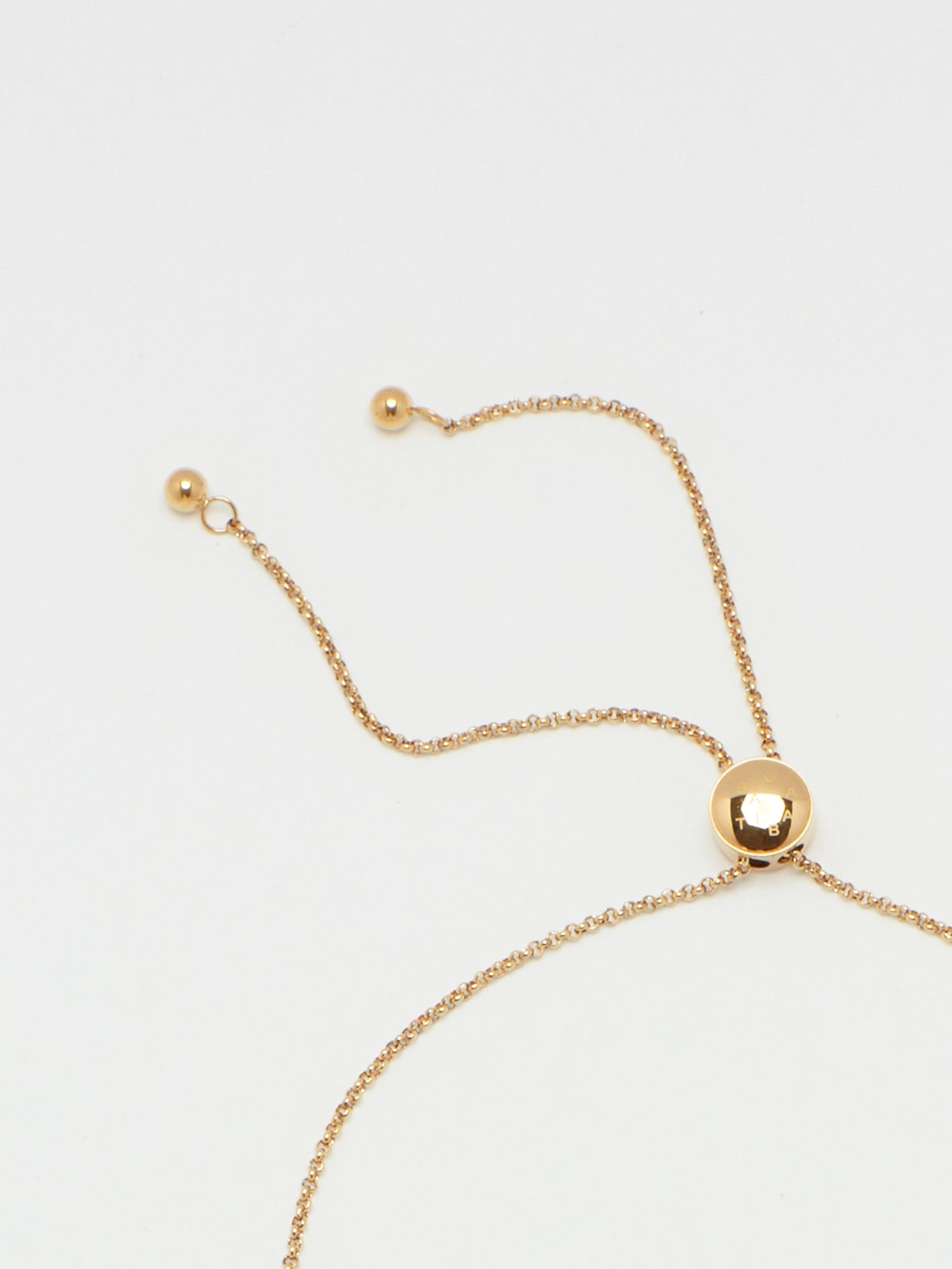 Detail flat lay of clasp on Adjustable Gold Tab Necklace Necklace bagatiba 