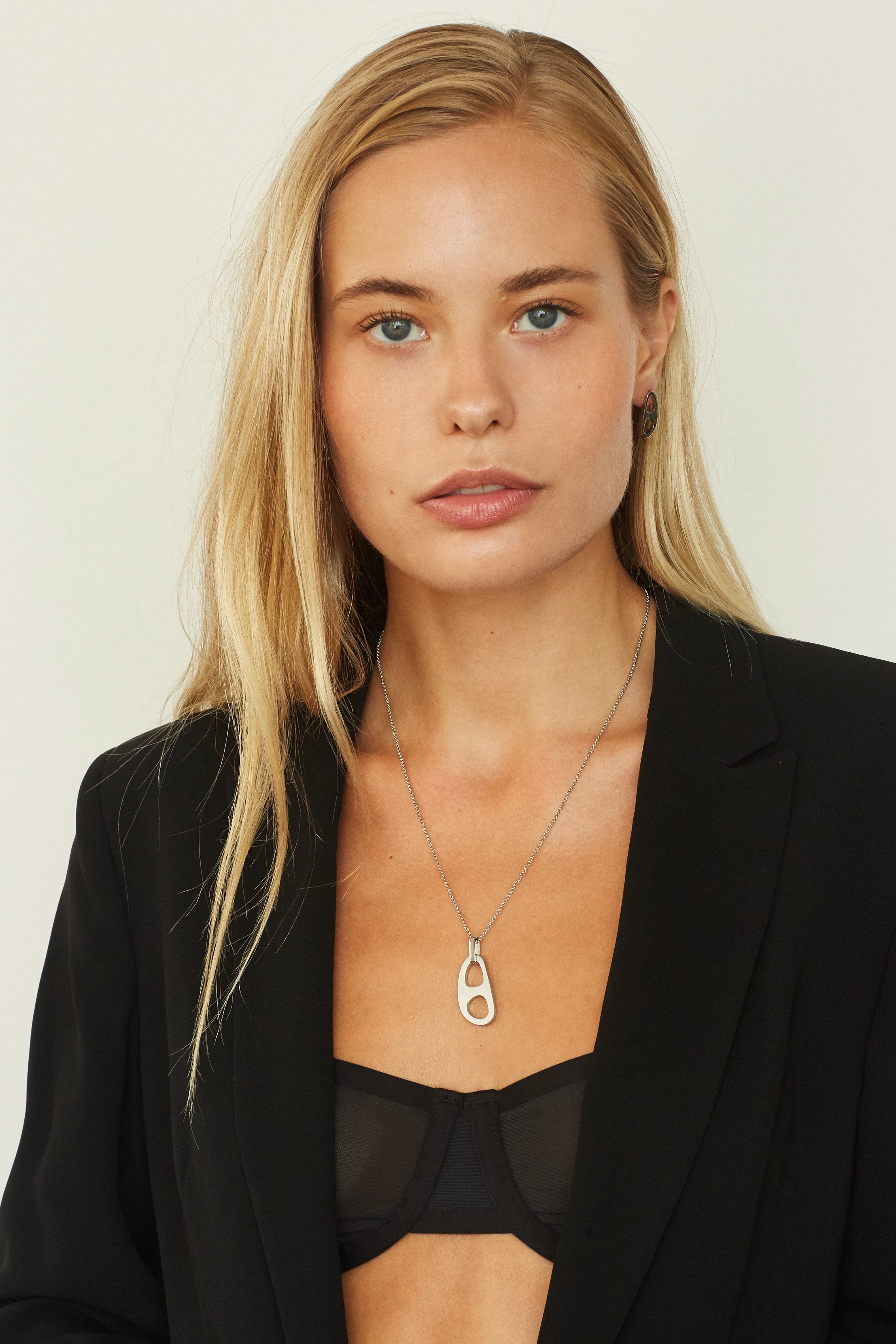 Model wearing Adjustable Silver Tab Necklace and Silver tab studs  bagatiba 