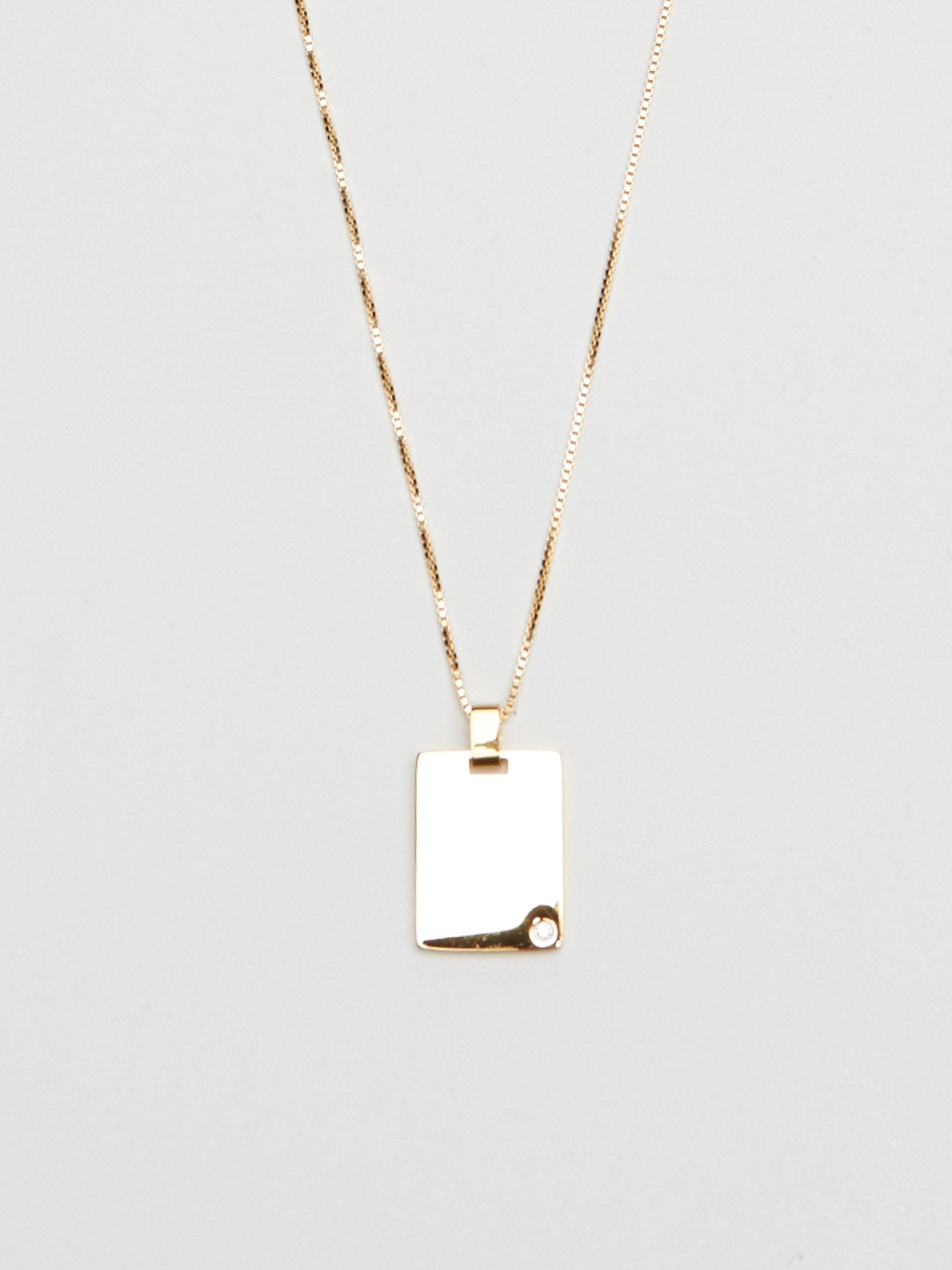 Cropped view flat lay of reverse side Bagatiba Long Cage Necklace Necklace Bagatiba 