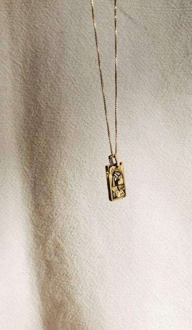 Detail shot of Bagatiba Cage Necklace Charm on chain