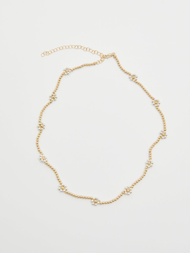 Full view on Bloom Necklace flat lay in gold