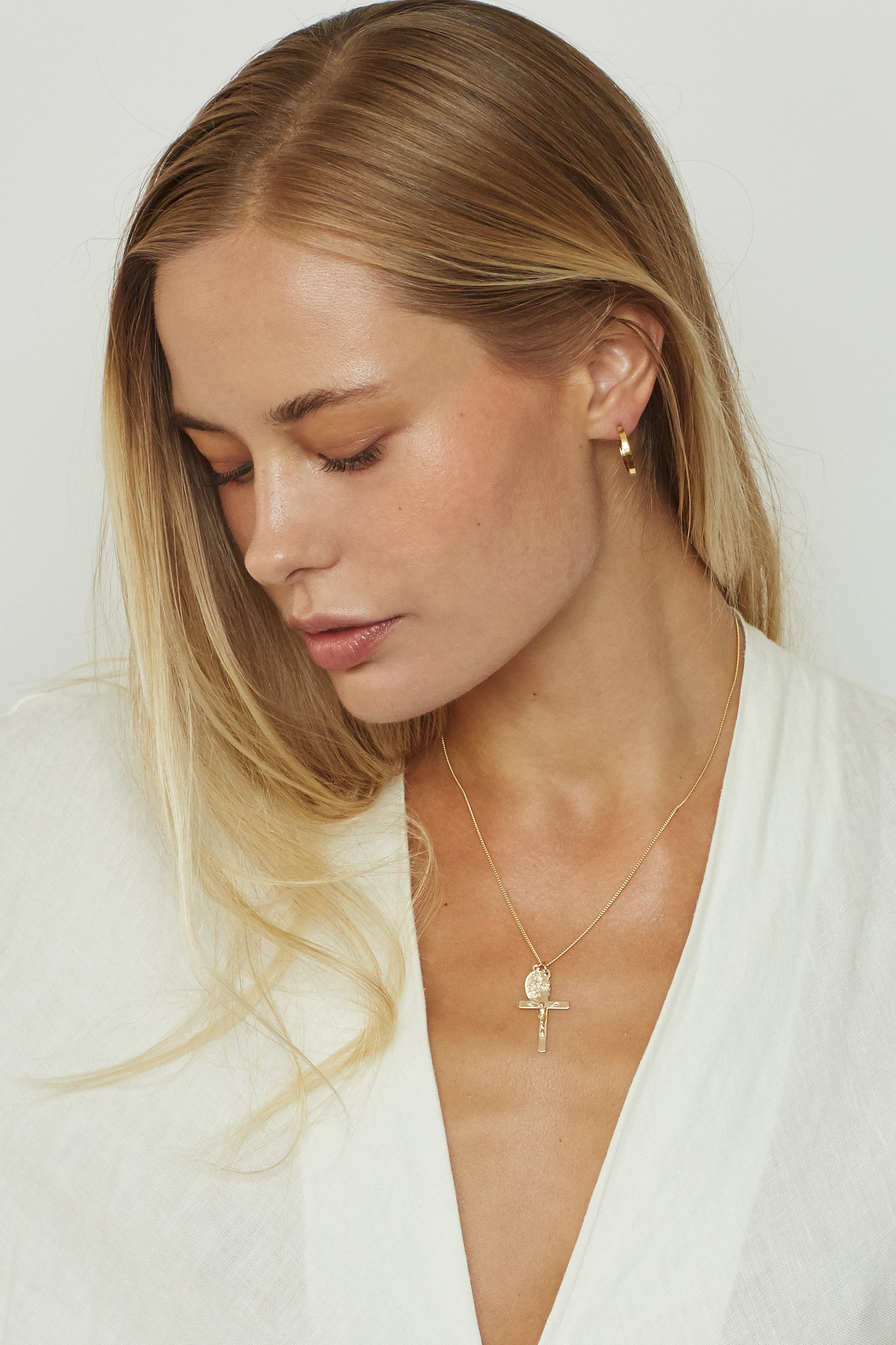 Profile view of model wearing D2C Necklace Necklace Bagatiba 