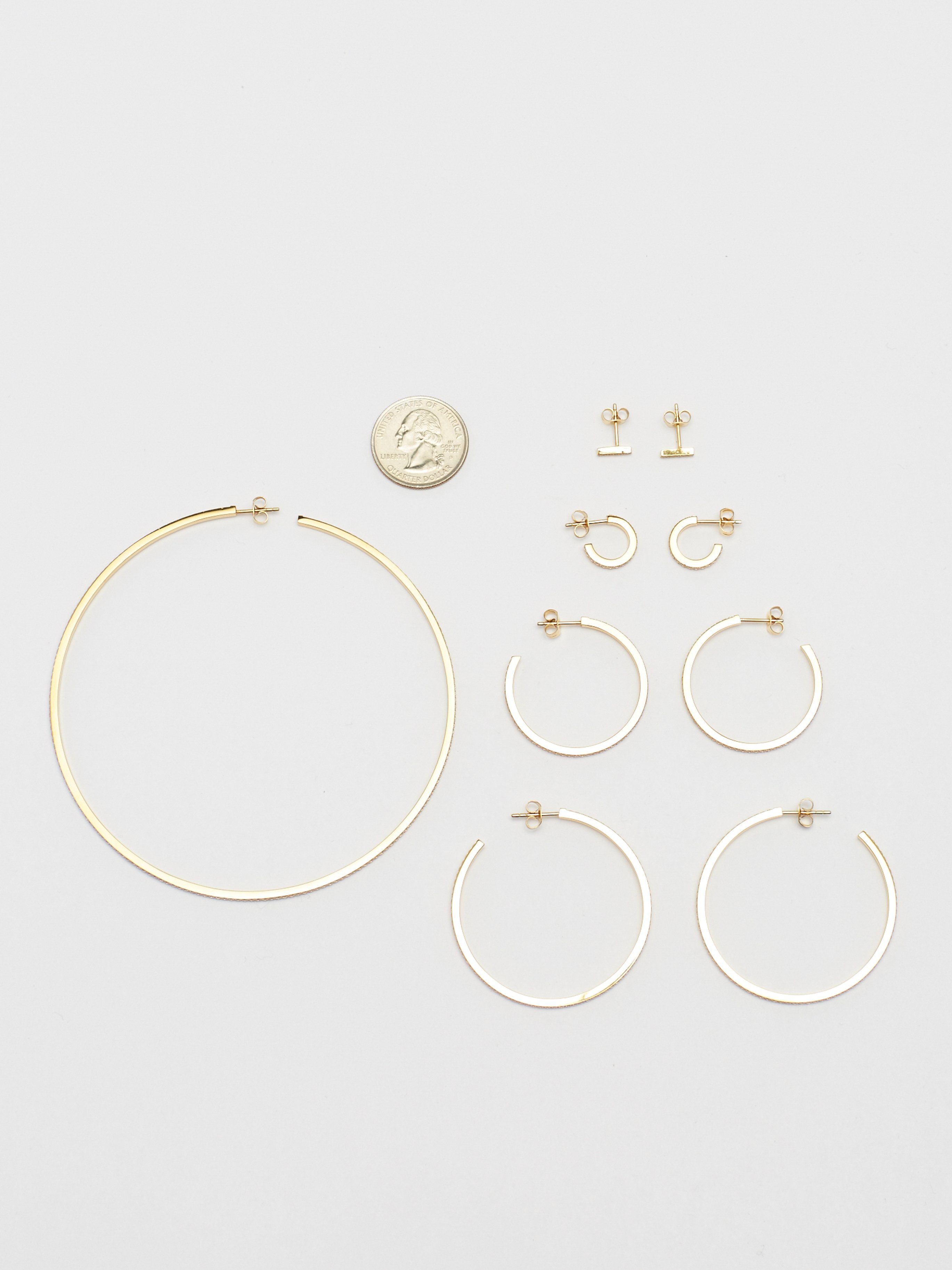 Full view flat lay of Diamond Earrings collection including Bar Studs Earrings Bagatiba 
