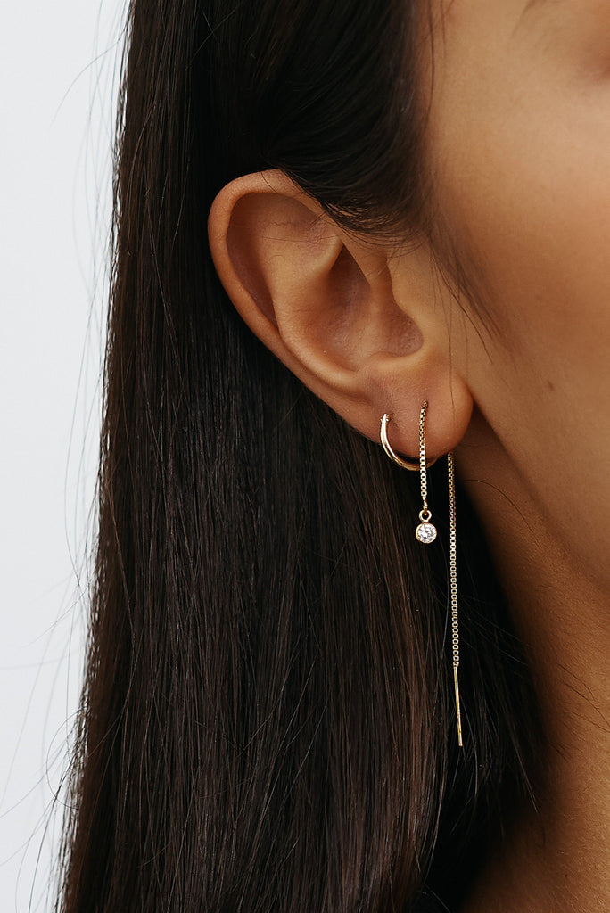 Cropped view on model of Diamond Ear Thread Earrings bagatiba 