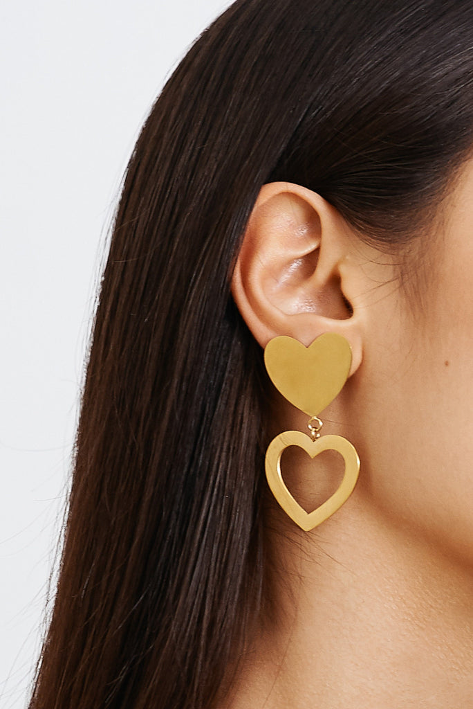 Cropped view on model of Double Heart Stud Earrings Earrings bagatiba 