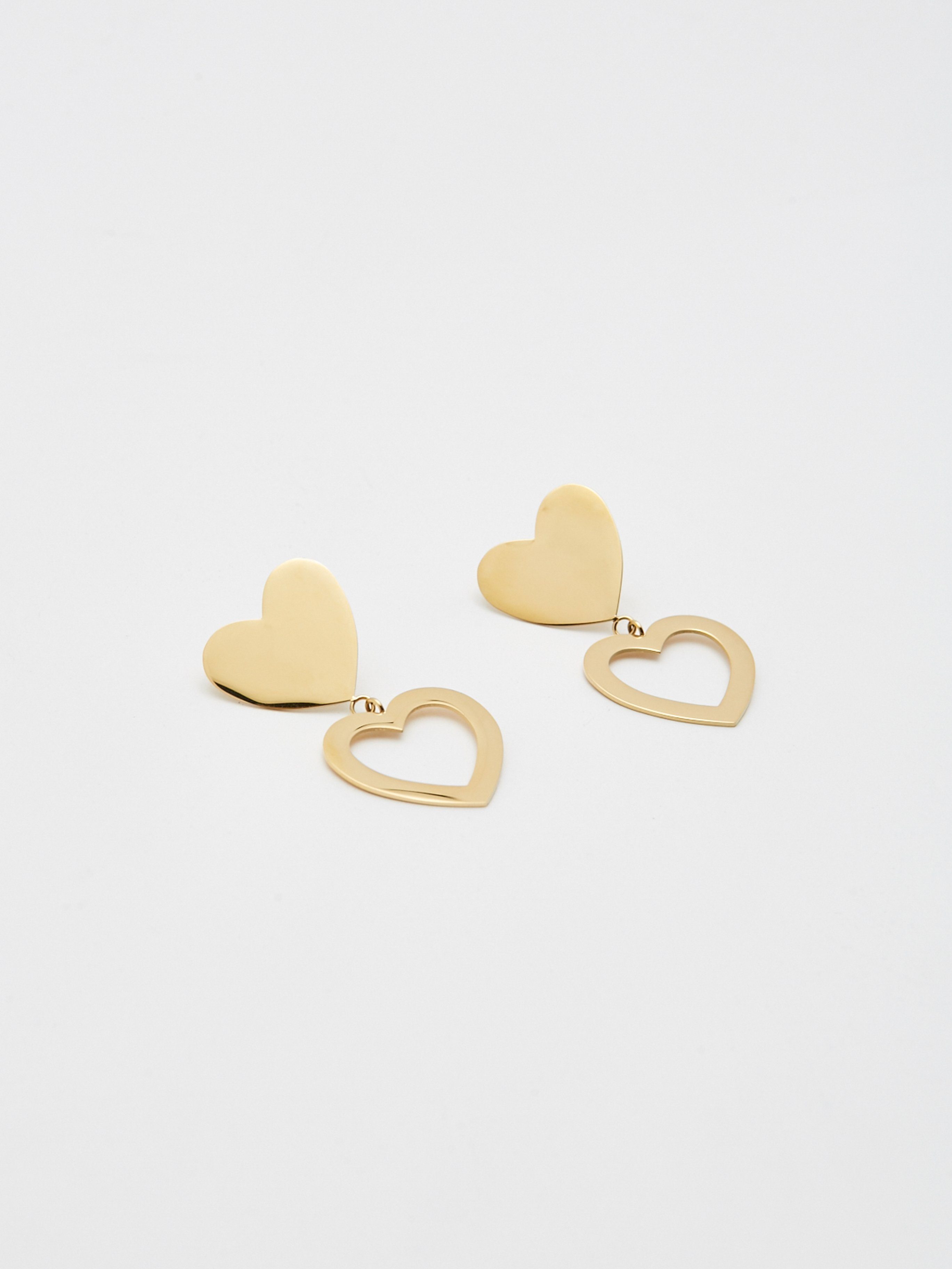 Flat lay view of Double Heart Stud Earrings Earrings bagatiba 
