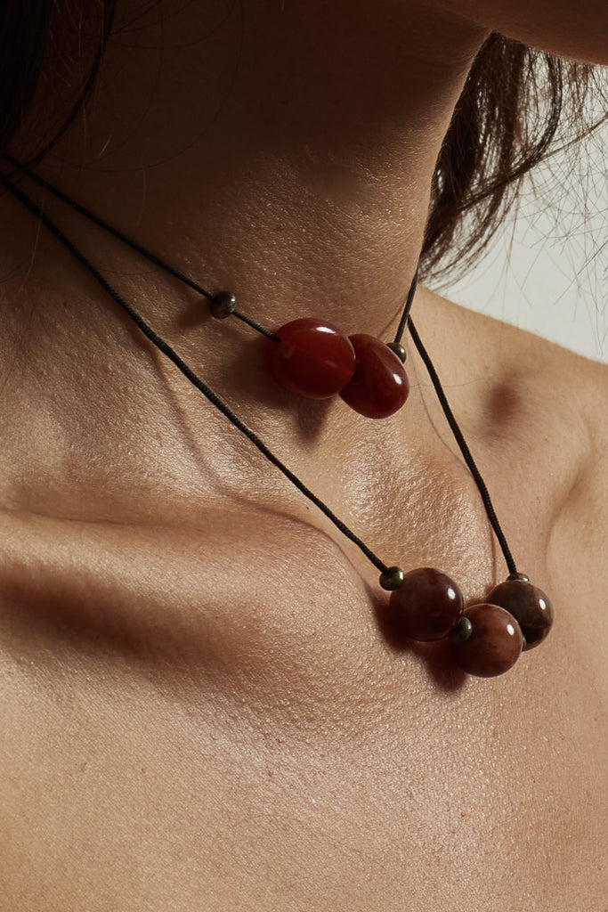 Double Red Agate Necklace necklace close up on skin