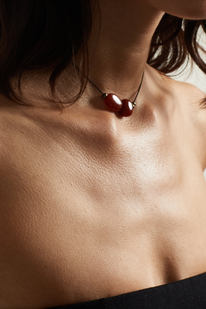 Double Red Agate Necklace necklace close up on model skin 
