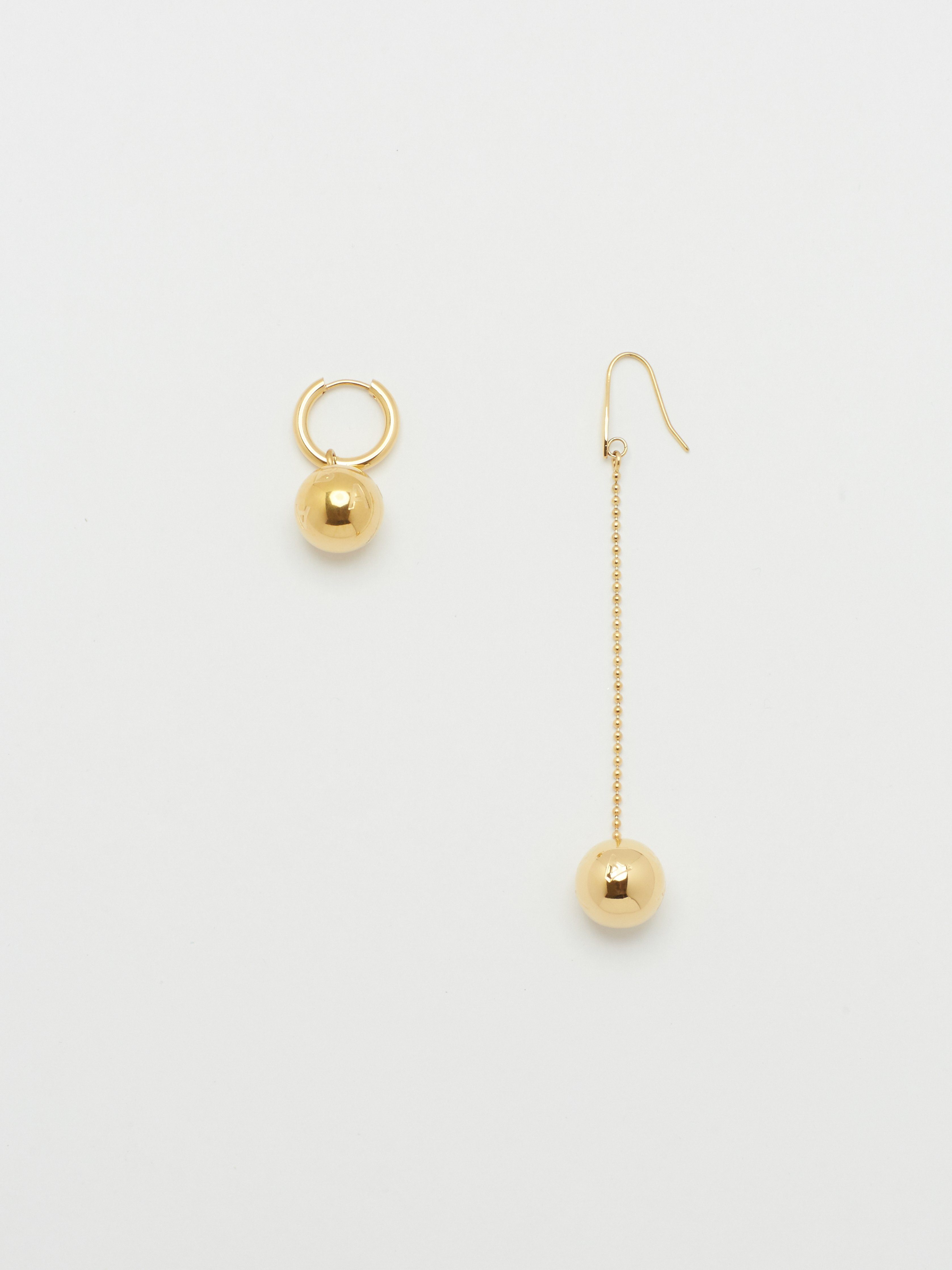Flat lay view of 1 Drop Sphere Earrings & 1 Sphere Hoop  Earrings bagatiba 