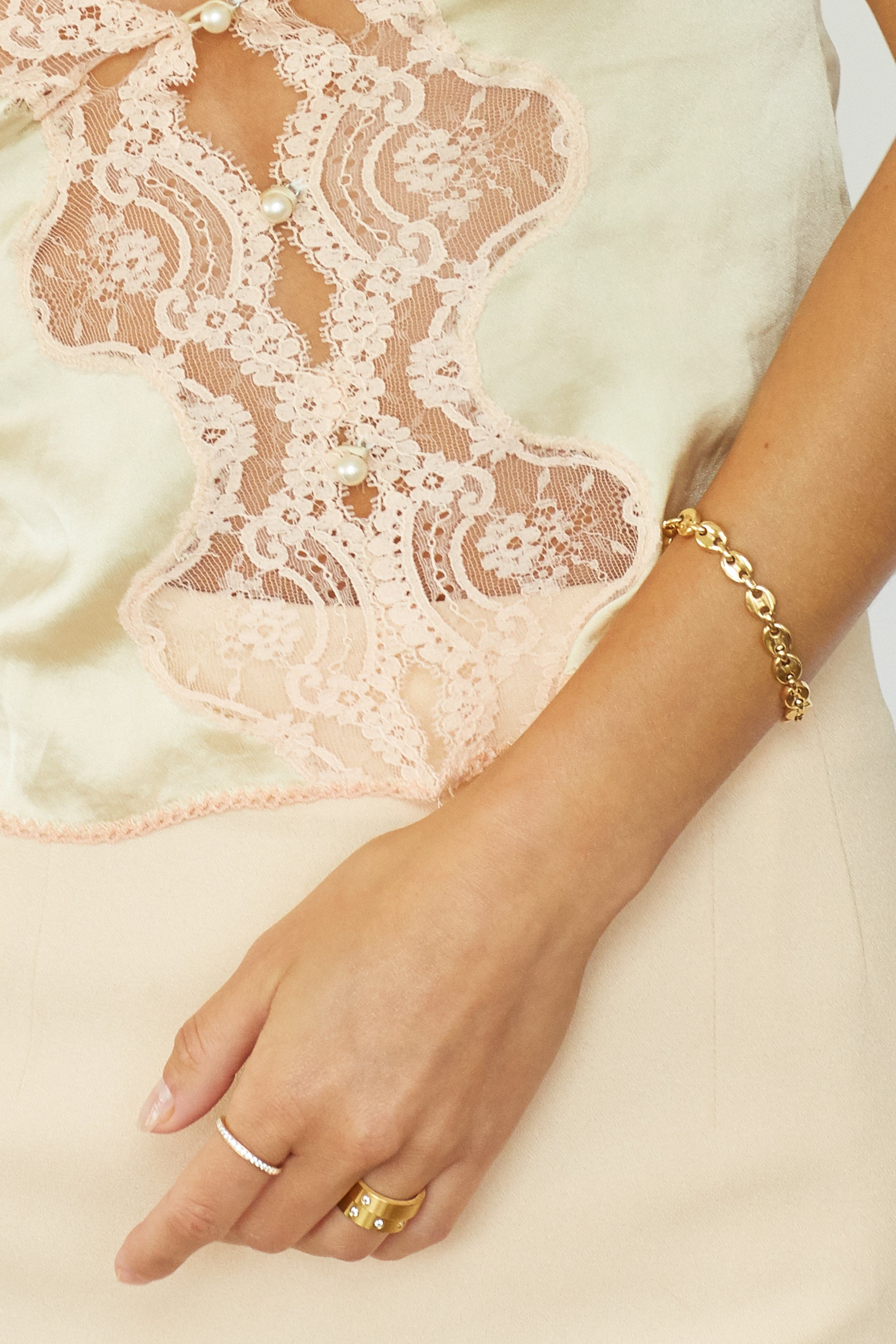 Cropped view of model torso and hand with Ella Diamond Ring Ring Bagatiba 