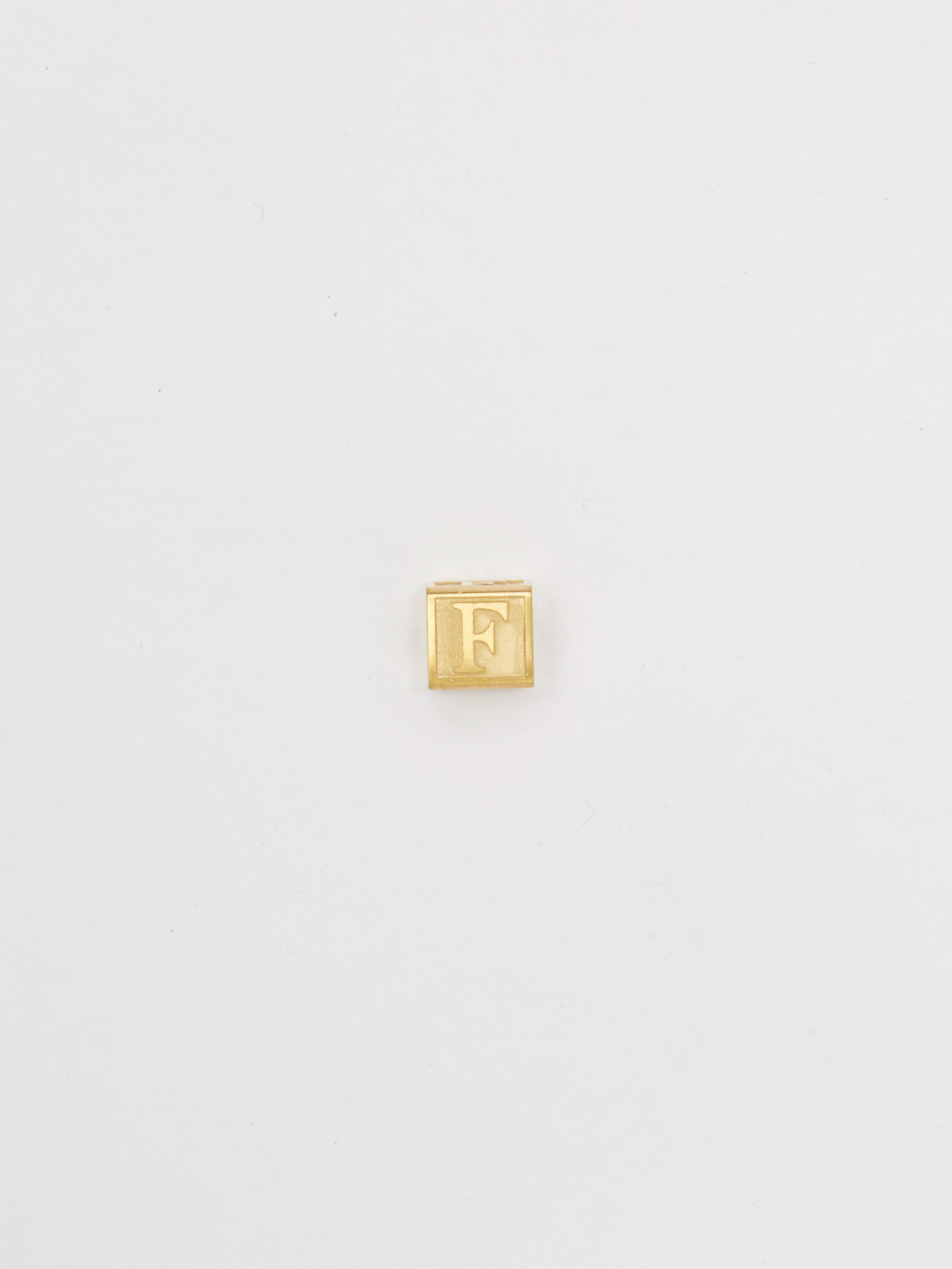 Close up flat lay of "F" Letter Block letters Bagatiba 