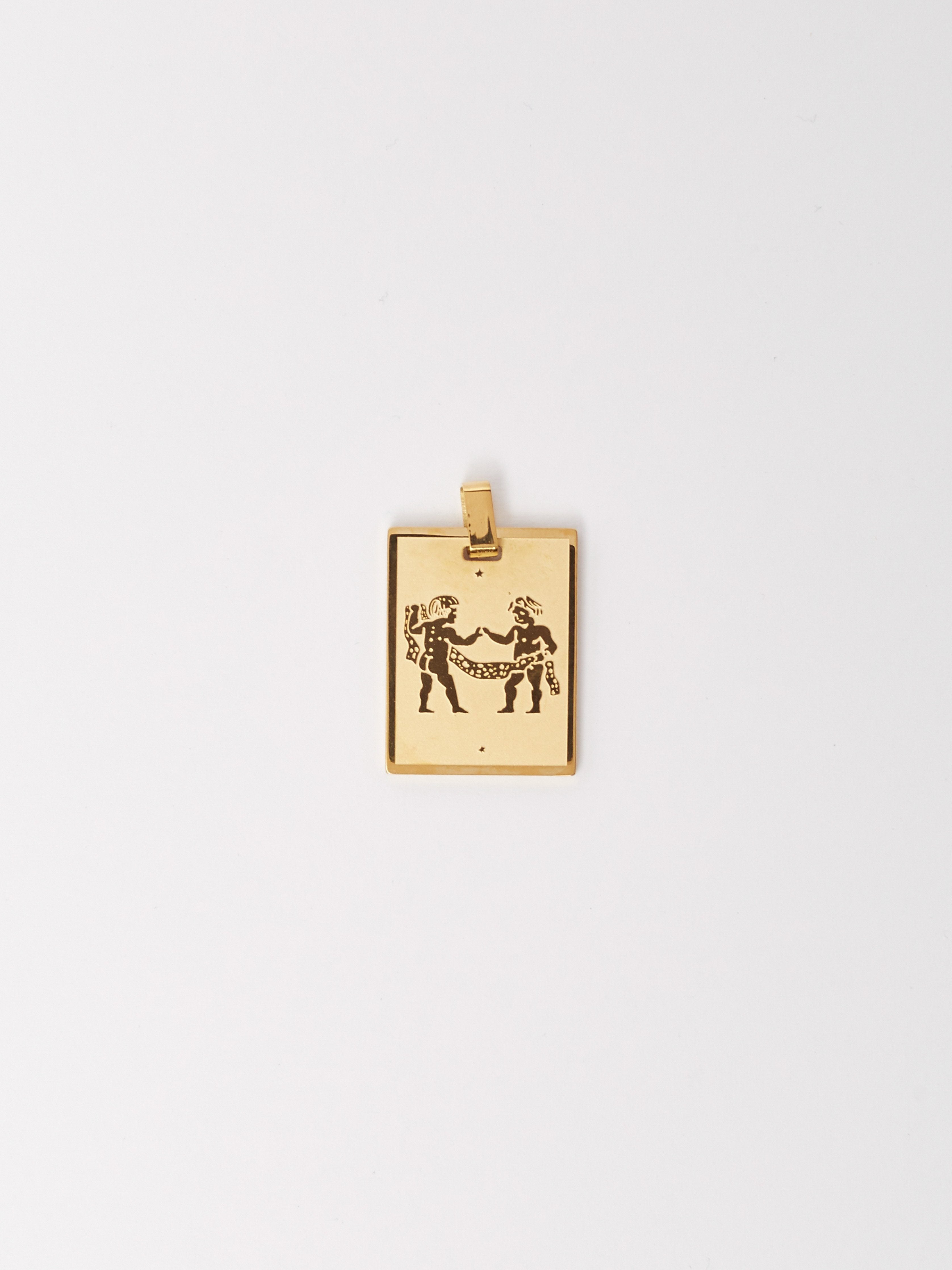 Close view flat lay of Gemini Charm charm Bagatiba 