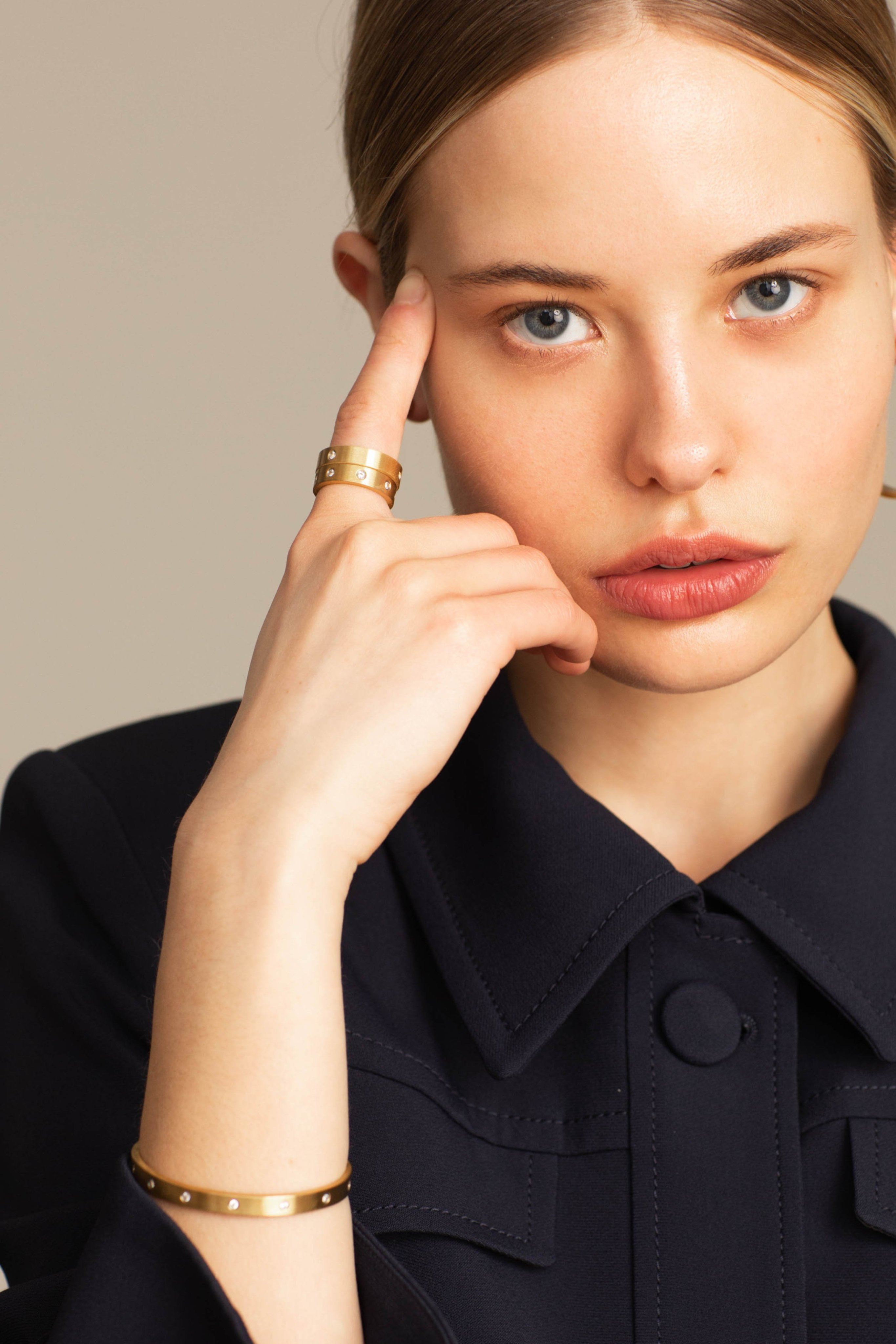 Cropped view of model wearing the Gemma Diamond Cuff Bracelet bagatiba 