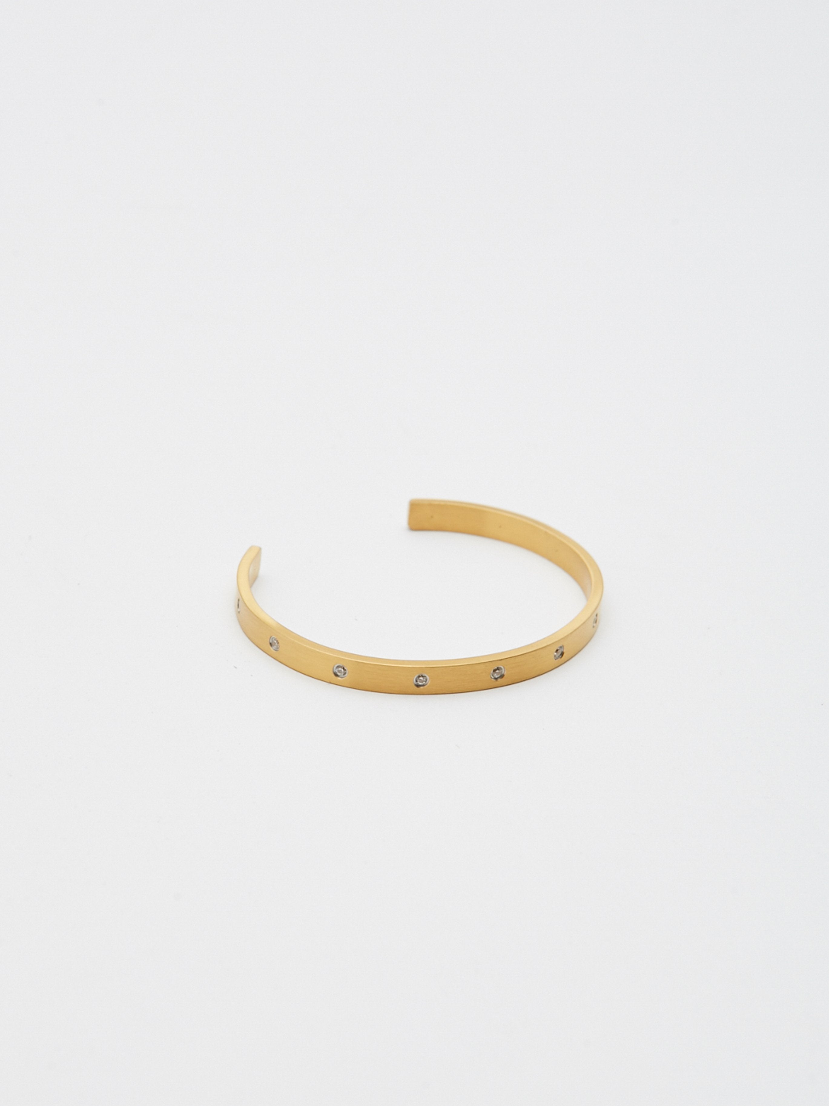 Flat lay of Gemma Diamond Cuff Bracelet bagatiba 