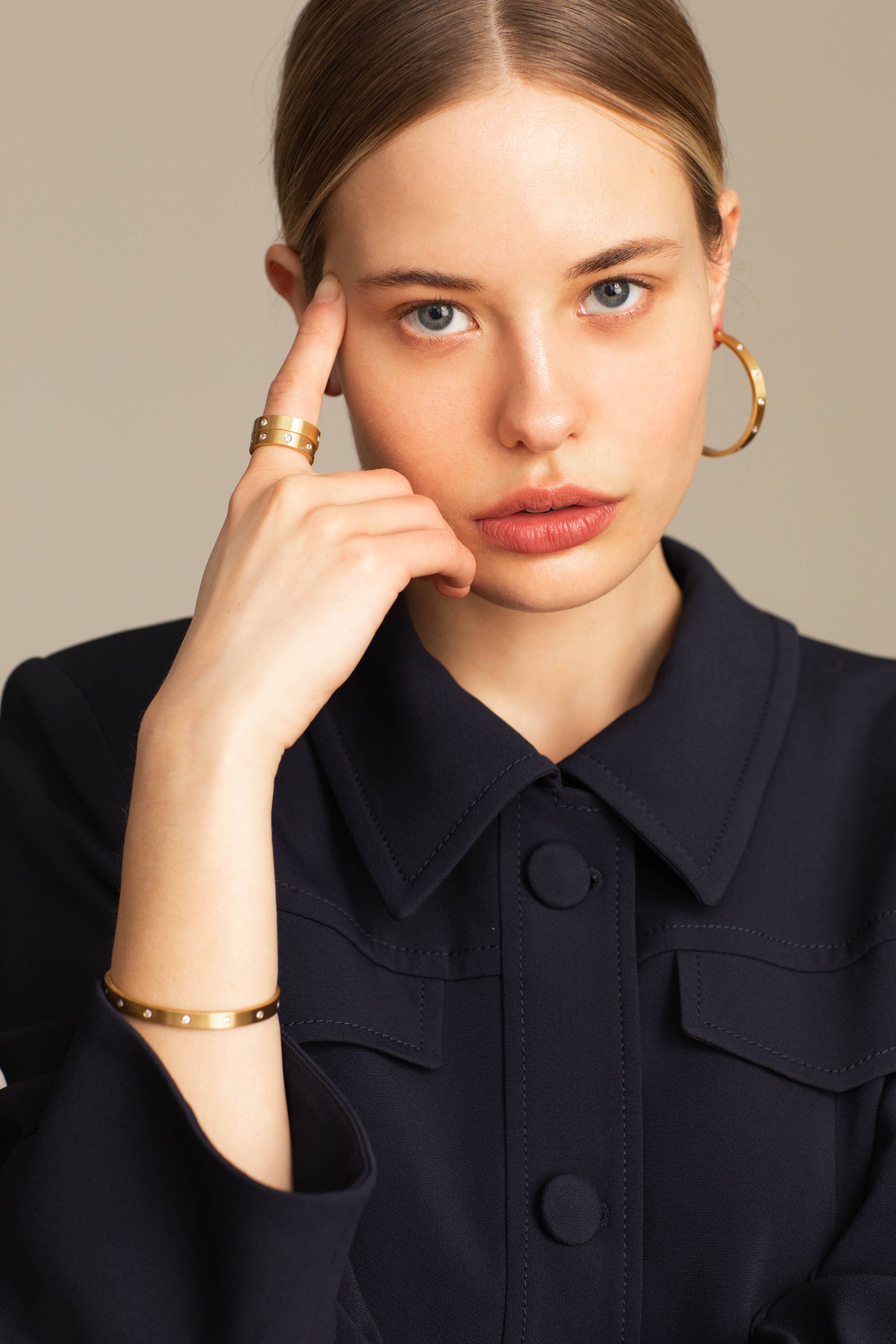 Model wearing the Gemma Diamond Hoops Earrings bagatiba 