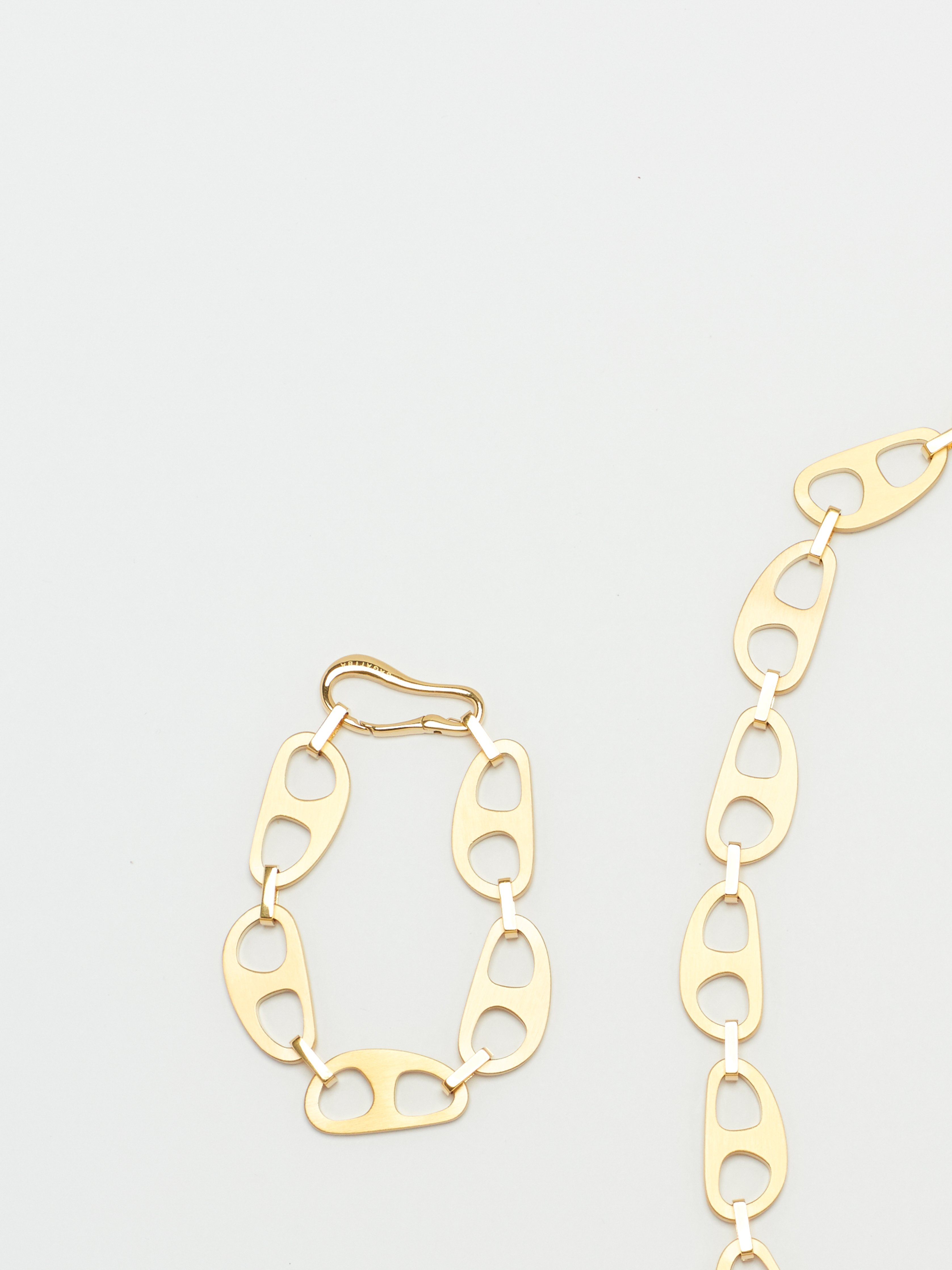 Detail Flat lay view of Gold Brushed Tab Necklace Necklace bagatiba 