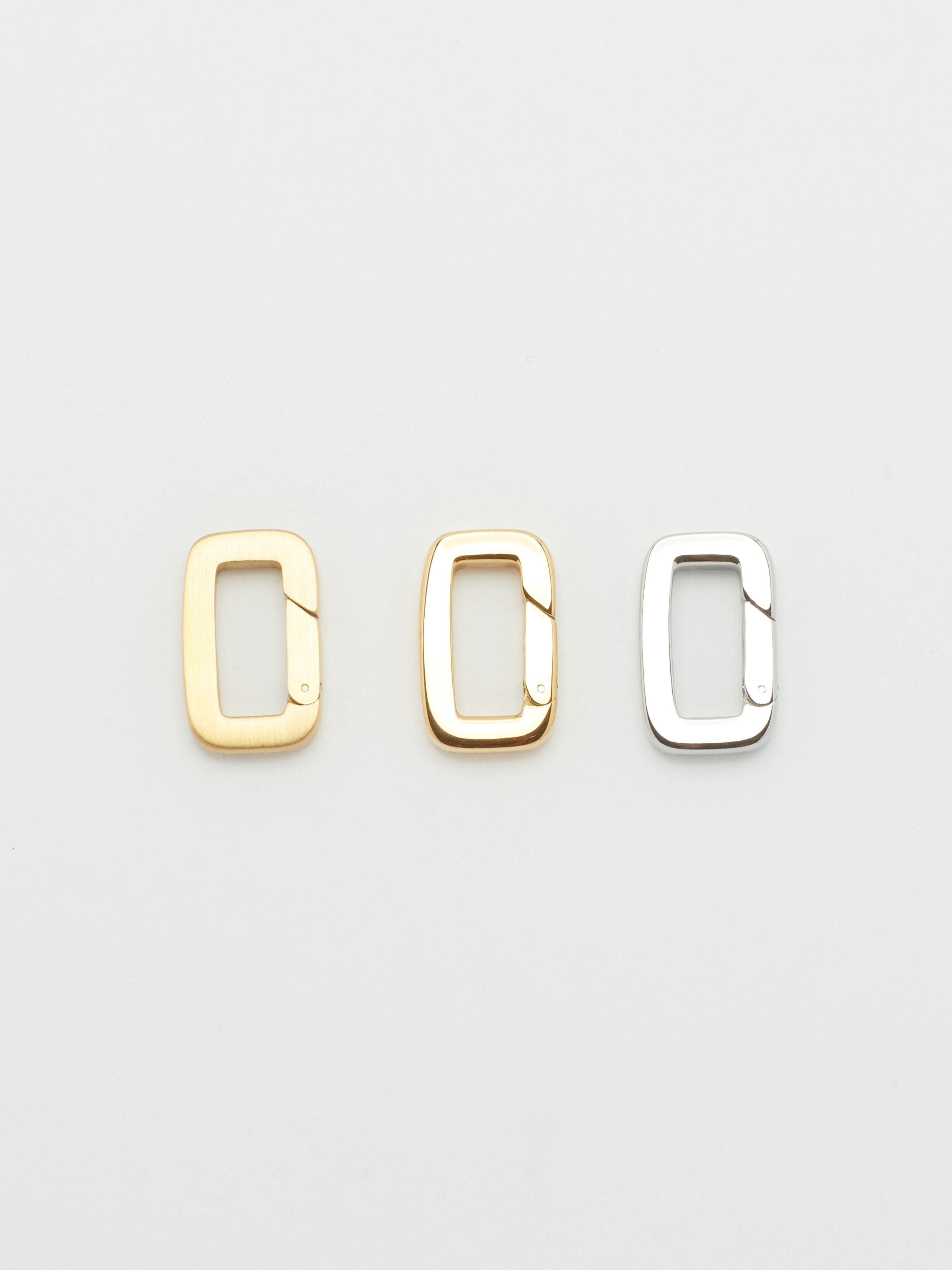 Top view flat lay of Gold, Brushed Gold & Silver  Cara Clip Body Bagatiba 