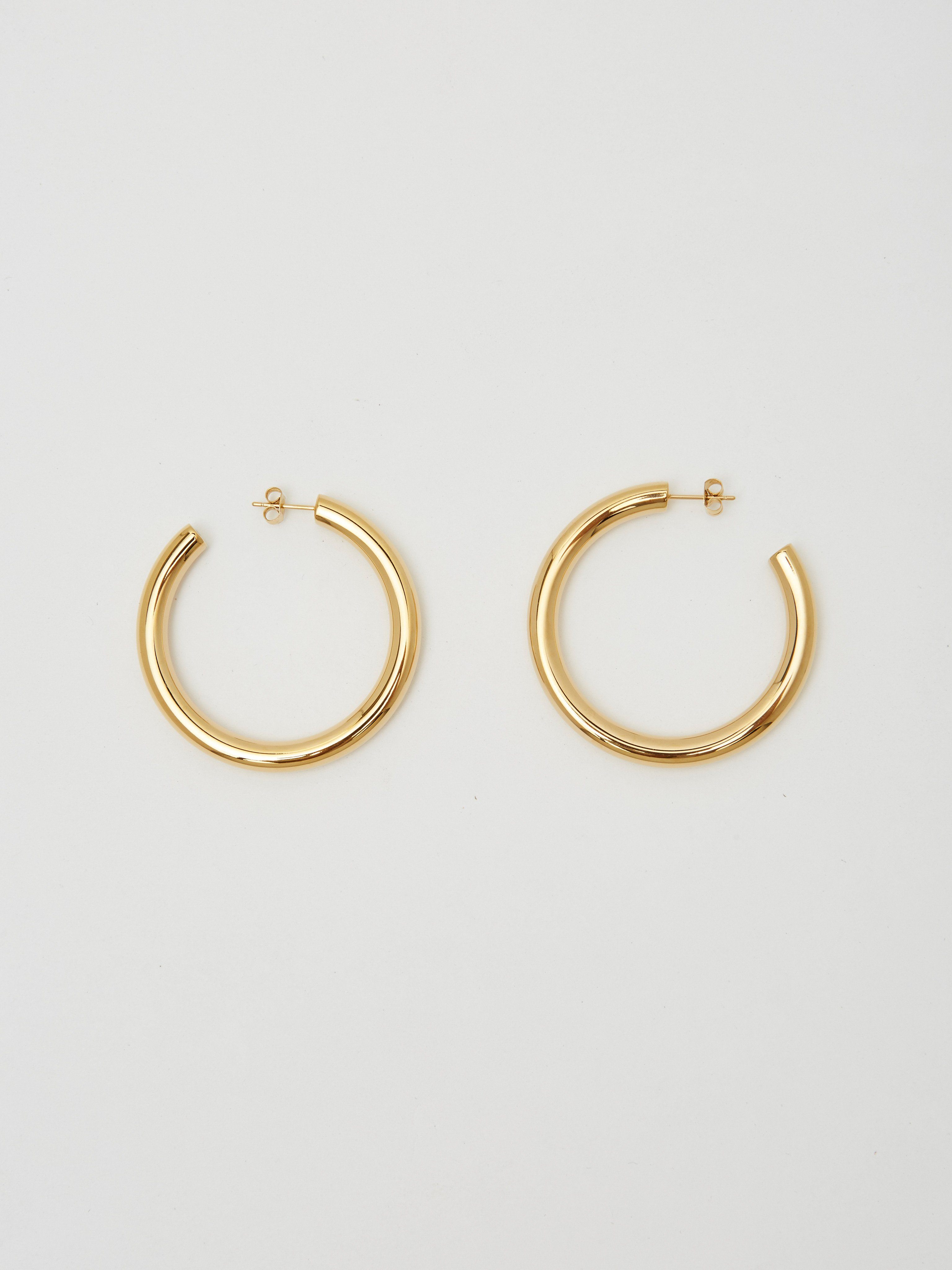 Full view flat lay of Gold Hollow Hoops Earrings Bagatiba 