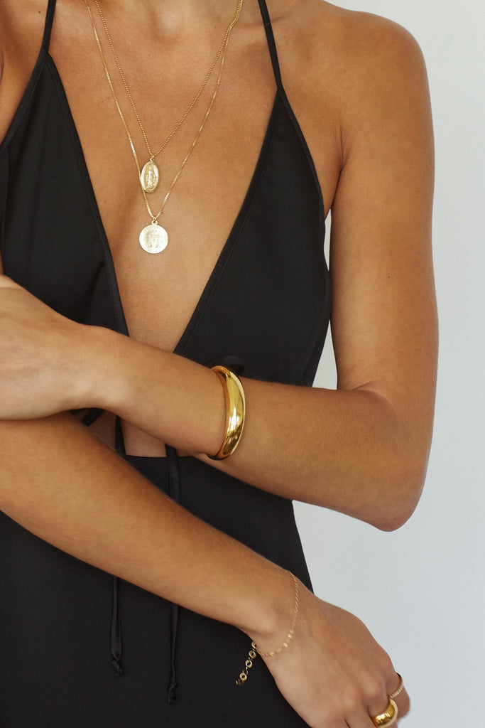 Cropped view on model of Gold Orb Cuff Bracelet bagatiba 