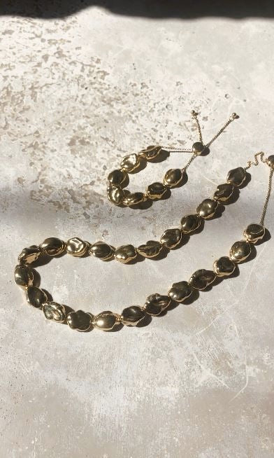 Gold Pearl Bracelet & Necklace in natural light