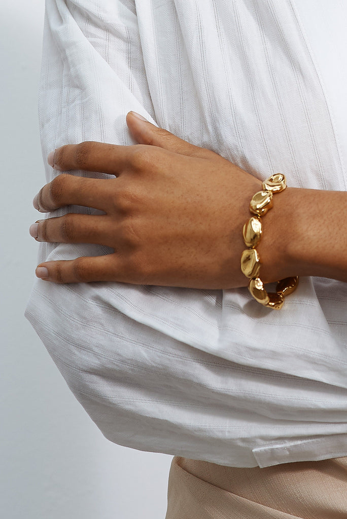 Detail view on wrist of Gold Pearl Bracelet Bracelet bagatiba 