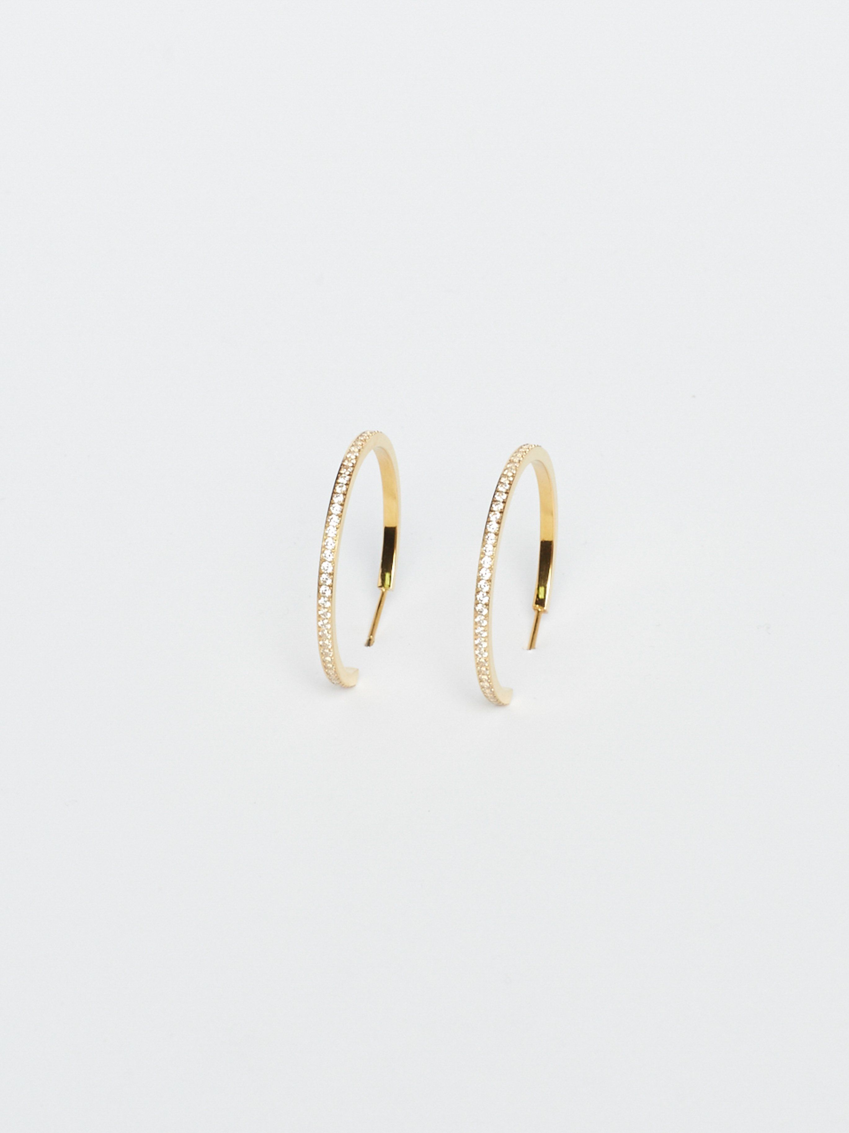Angled flat lay view of Large Diamond Hoops Earrings Bagatiba 