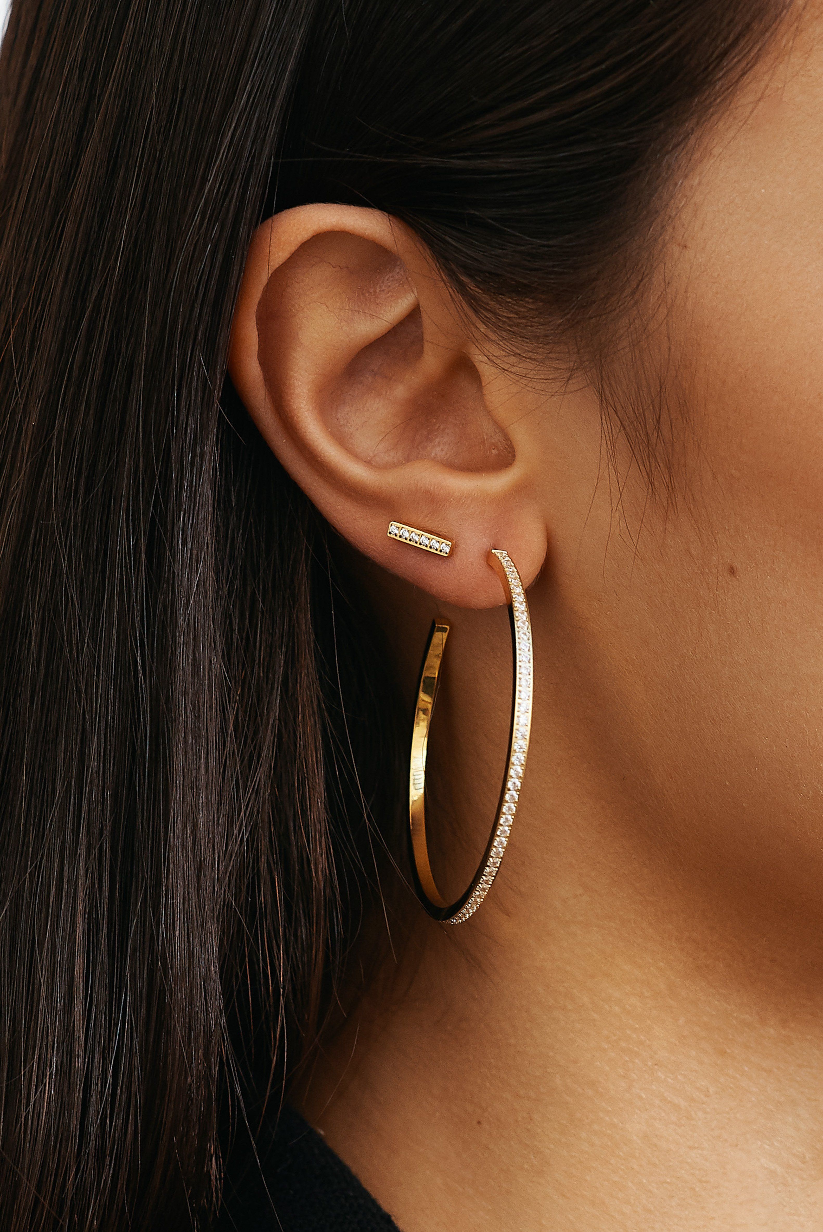 Cropped view model wearing Large Diamond Hoops Earrings Bagatiba 