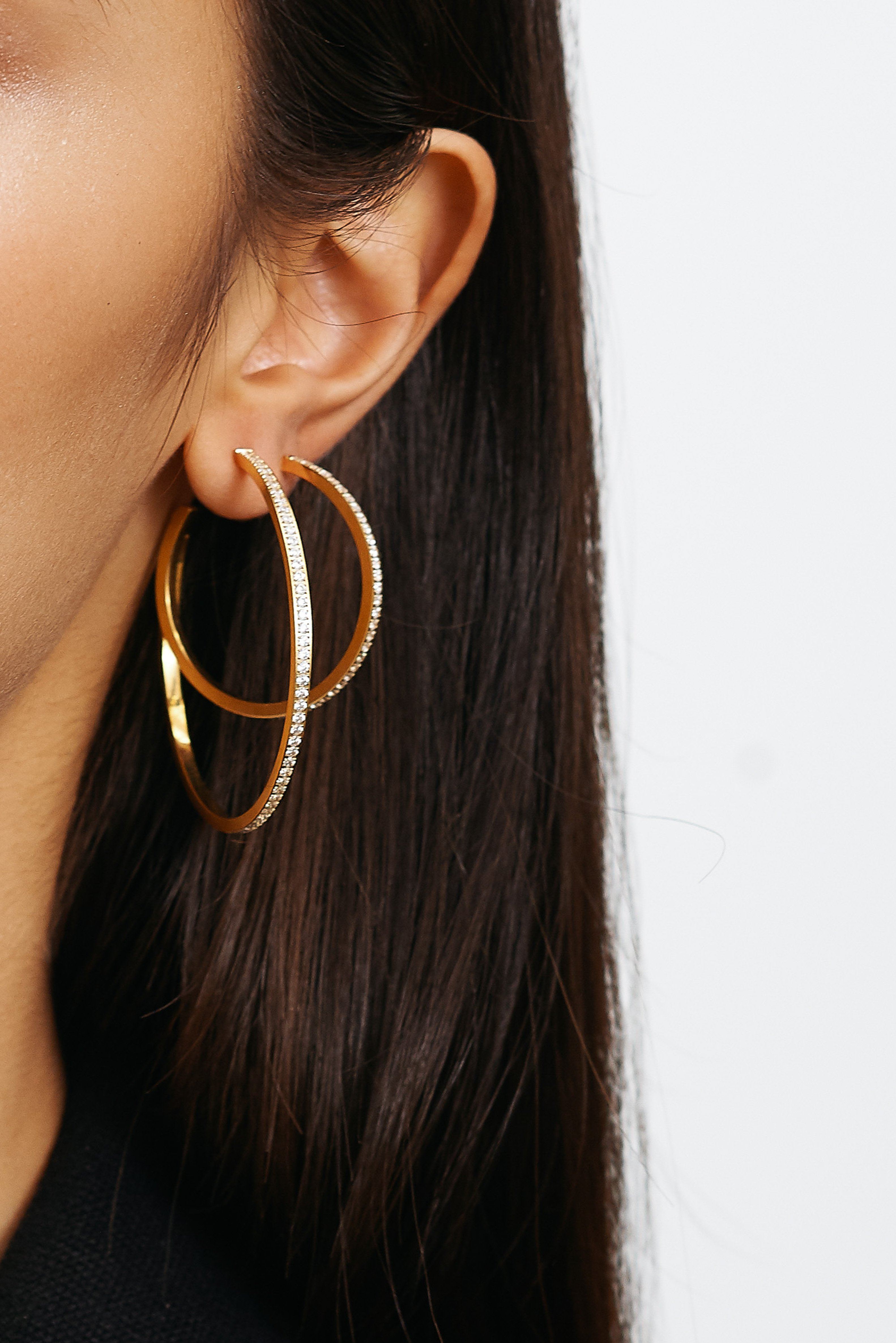 Detail view on model of Large Diamond Hoops Earrings Bagatiba 