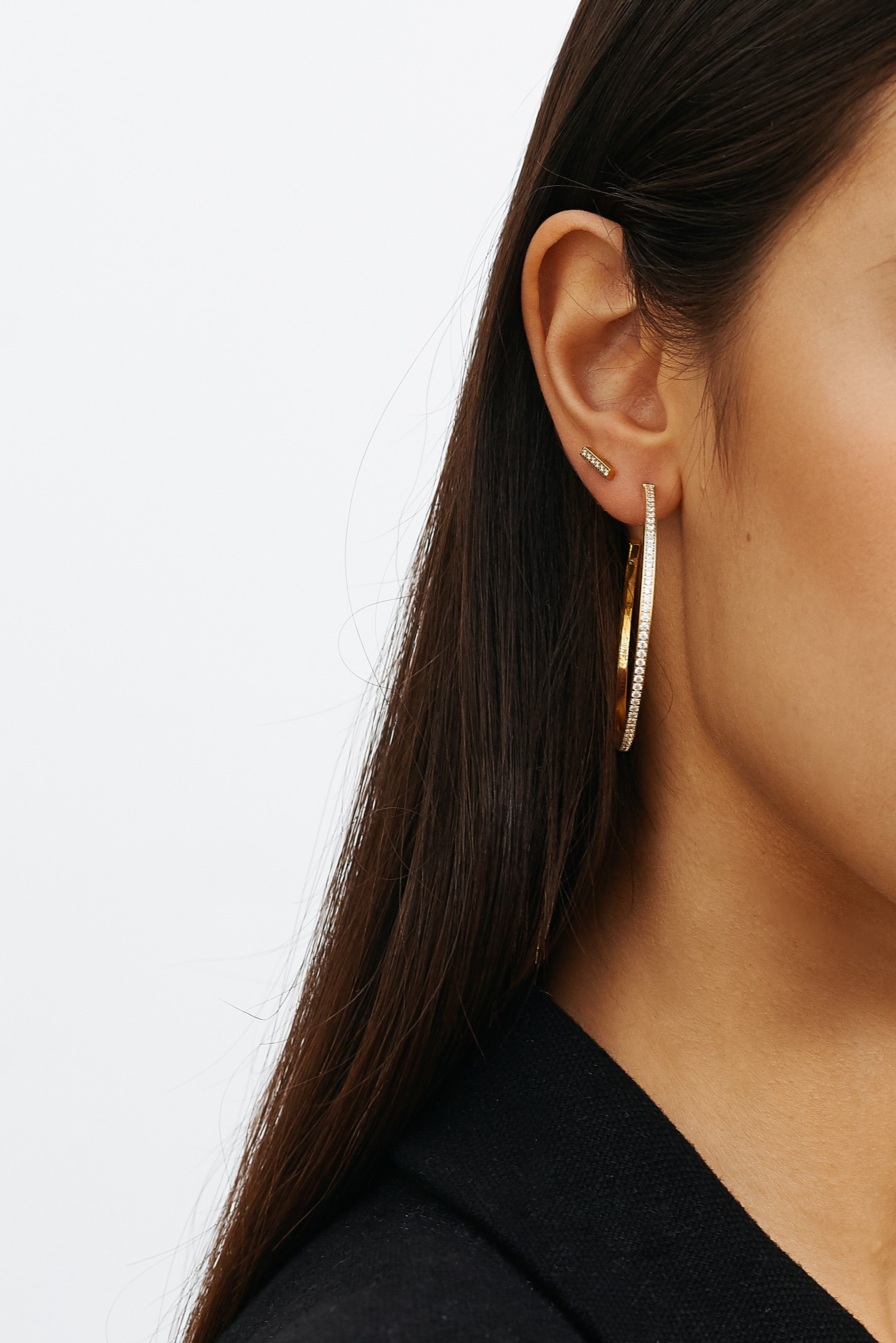 Model's ear with Large Diamond Hoops Earrings Bagatiba 