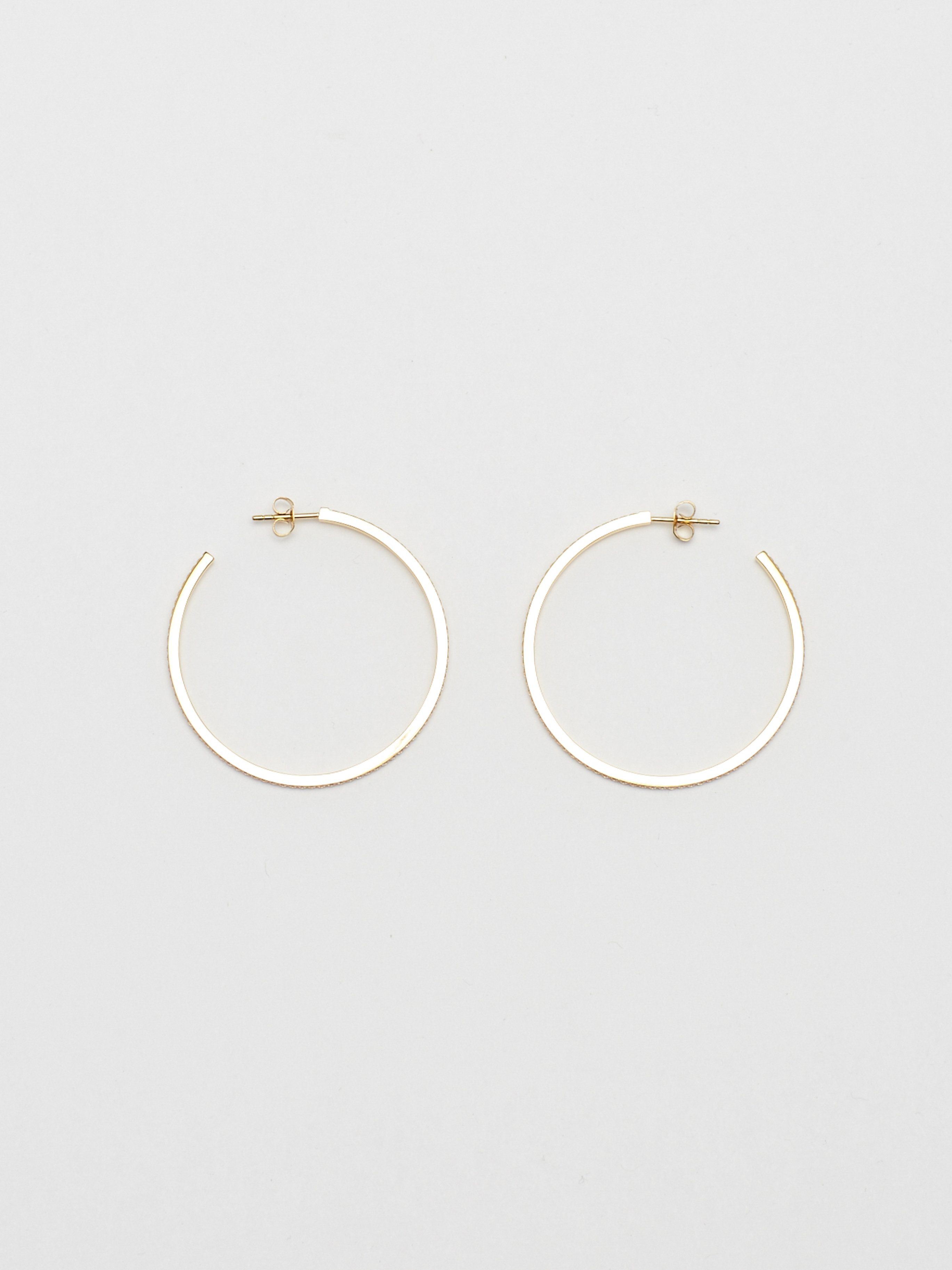 Flat lay of Large Diamond Hoops Earrings Bagatiba 