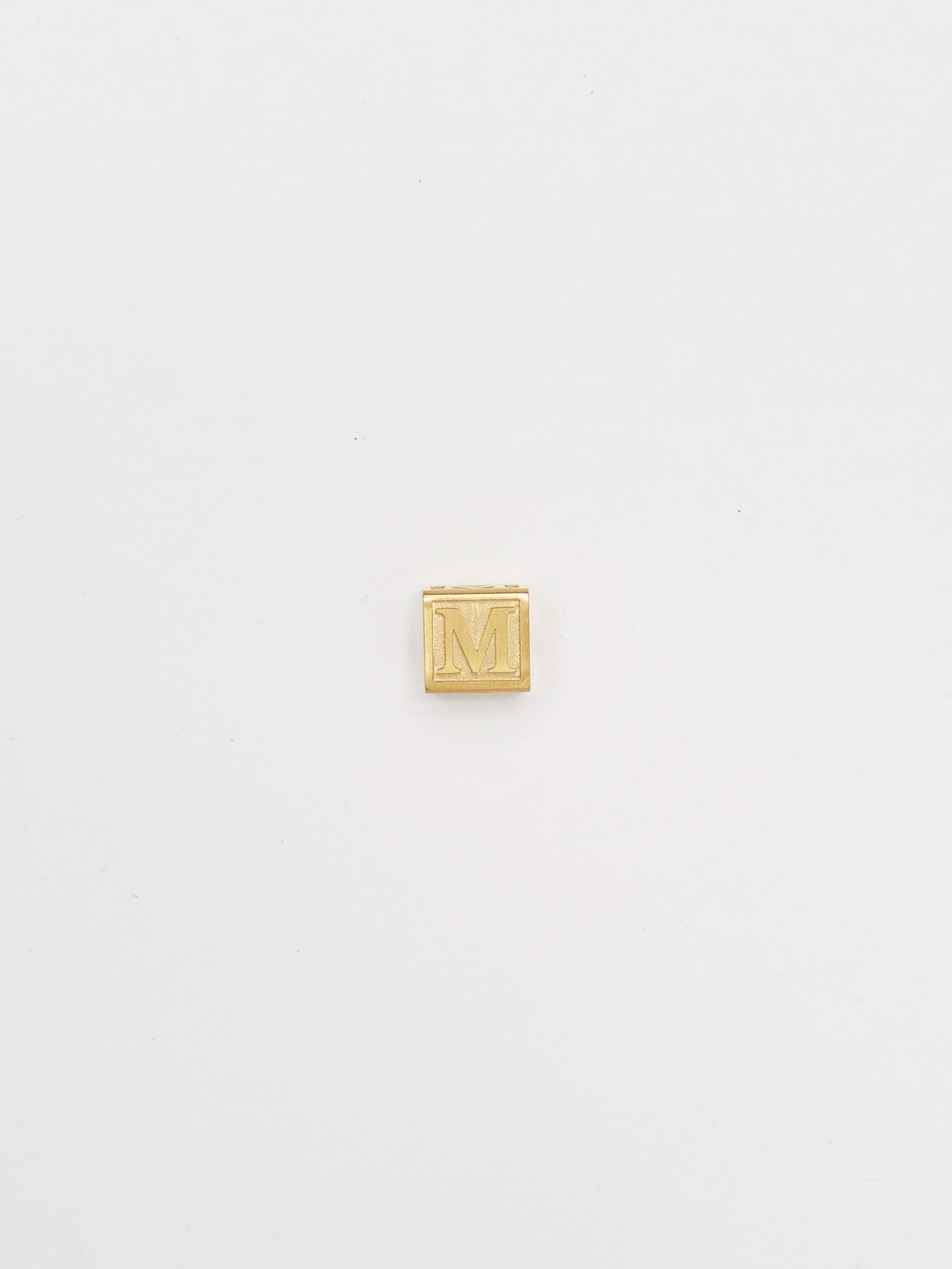 Full view flat lay "M" Letter Block letters Bagatiba 