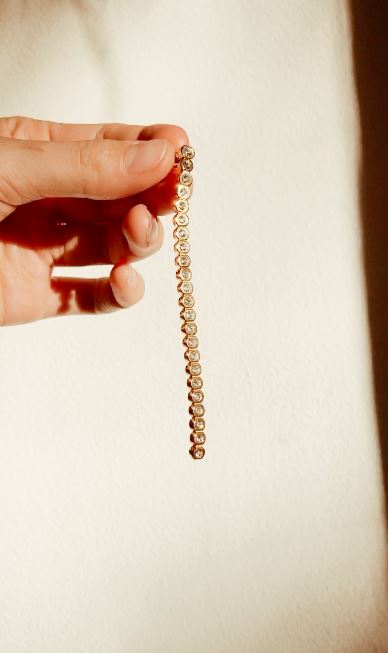 Mika Line Earring in natural light