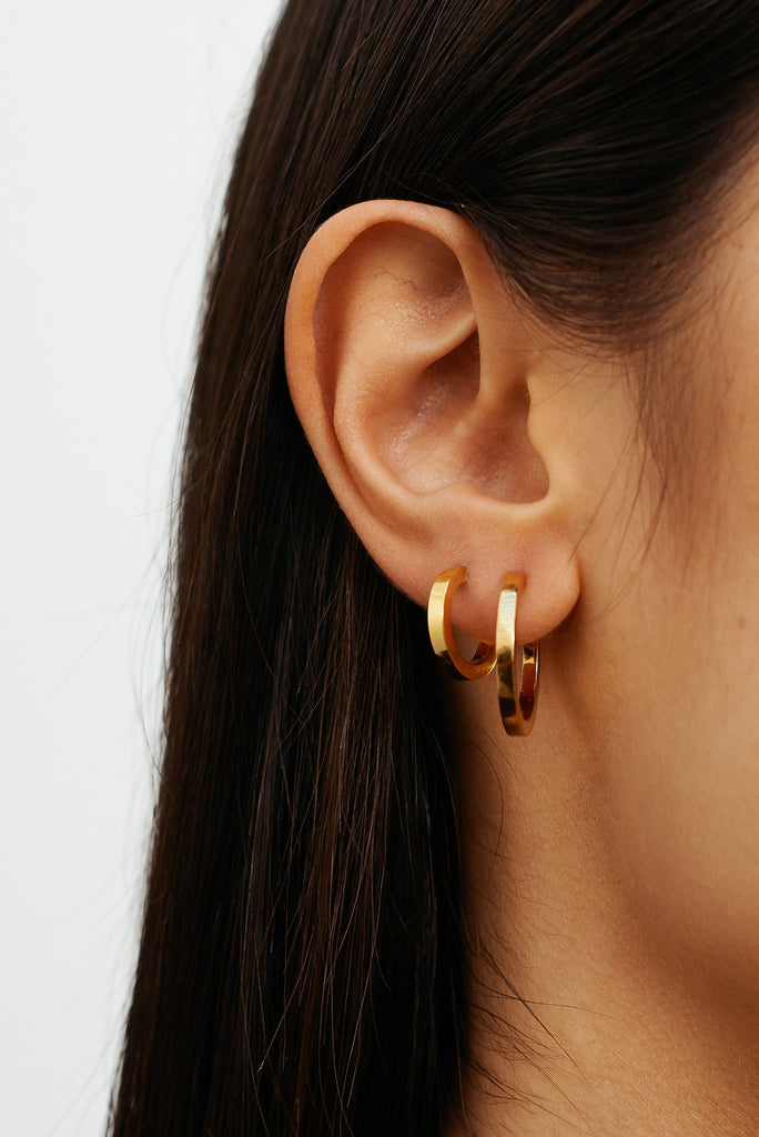 Detail view on model of Mini Simple Gold Hoops & Small Simple Gold Hoops  Earrings Bagatiba 