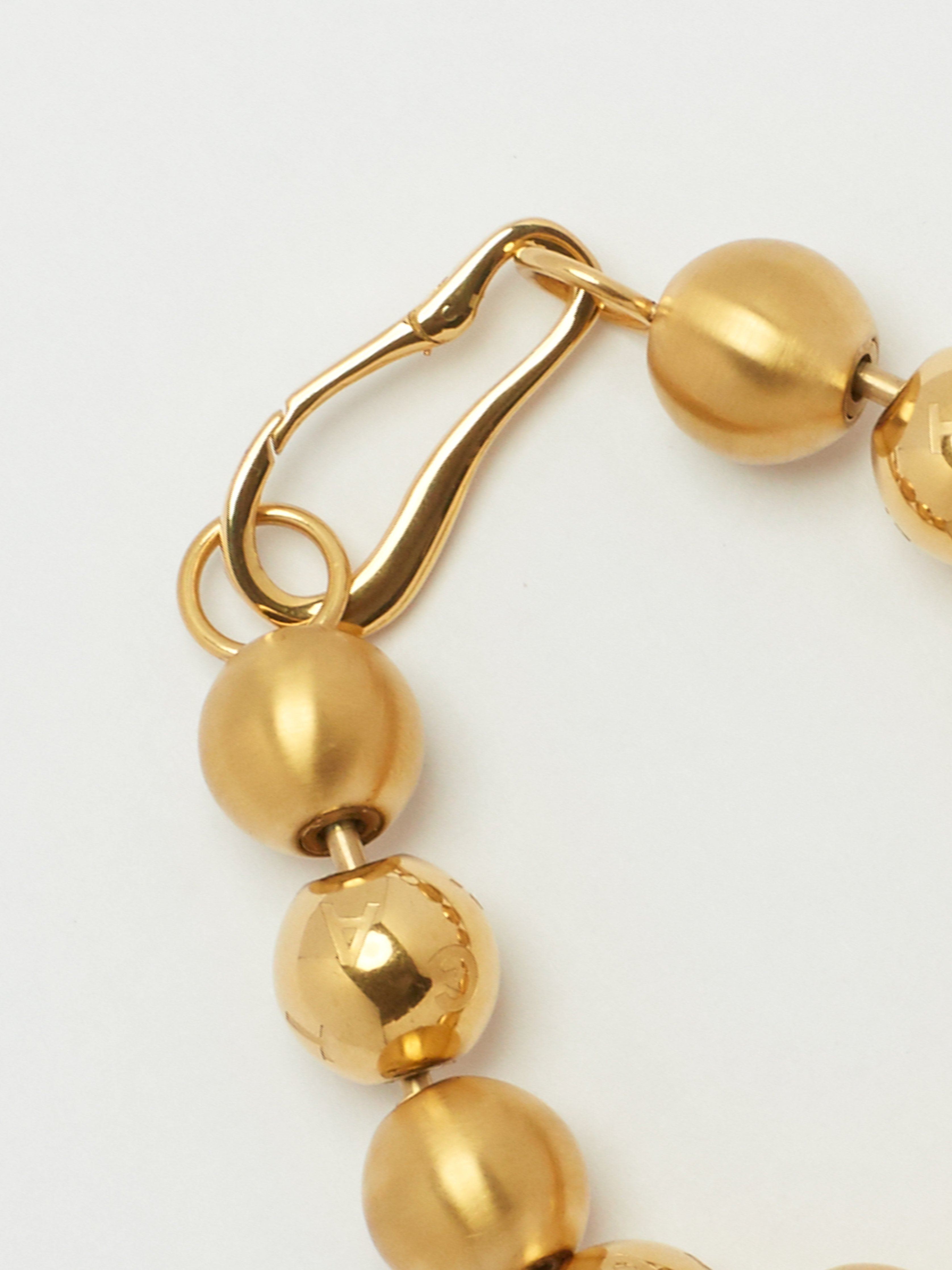 Detail flat lay view of Mixed Sphere Bracelet Necklace bagatiba 