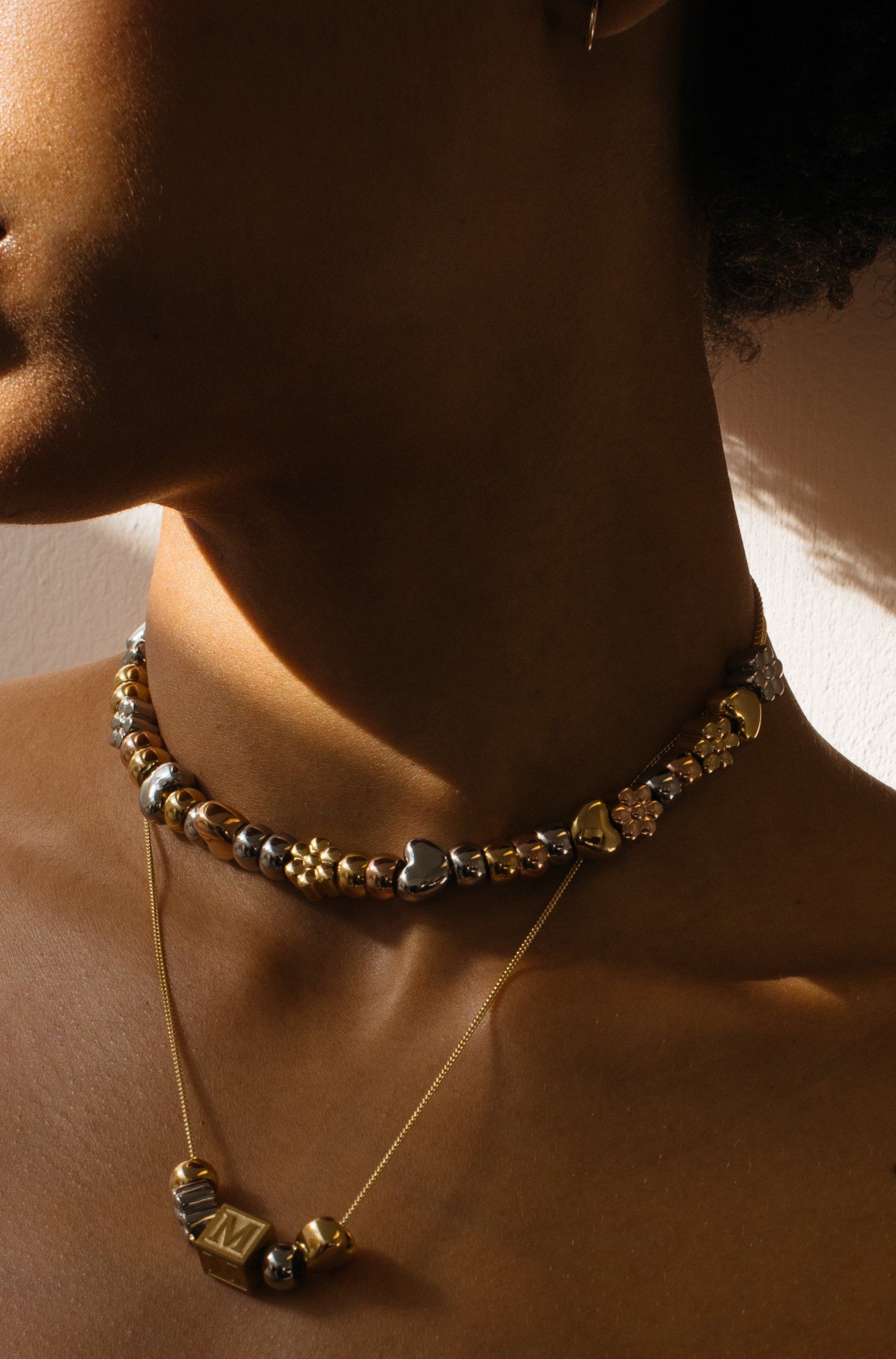 Model profile view wearing the Multi-Color Bead Set Bagatiba 