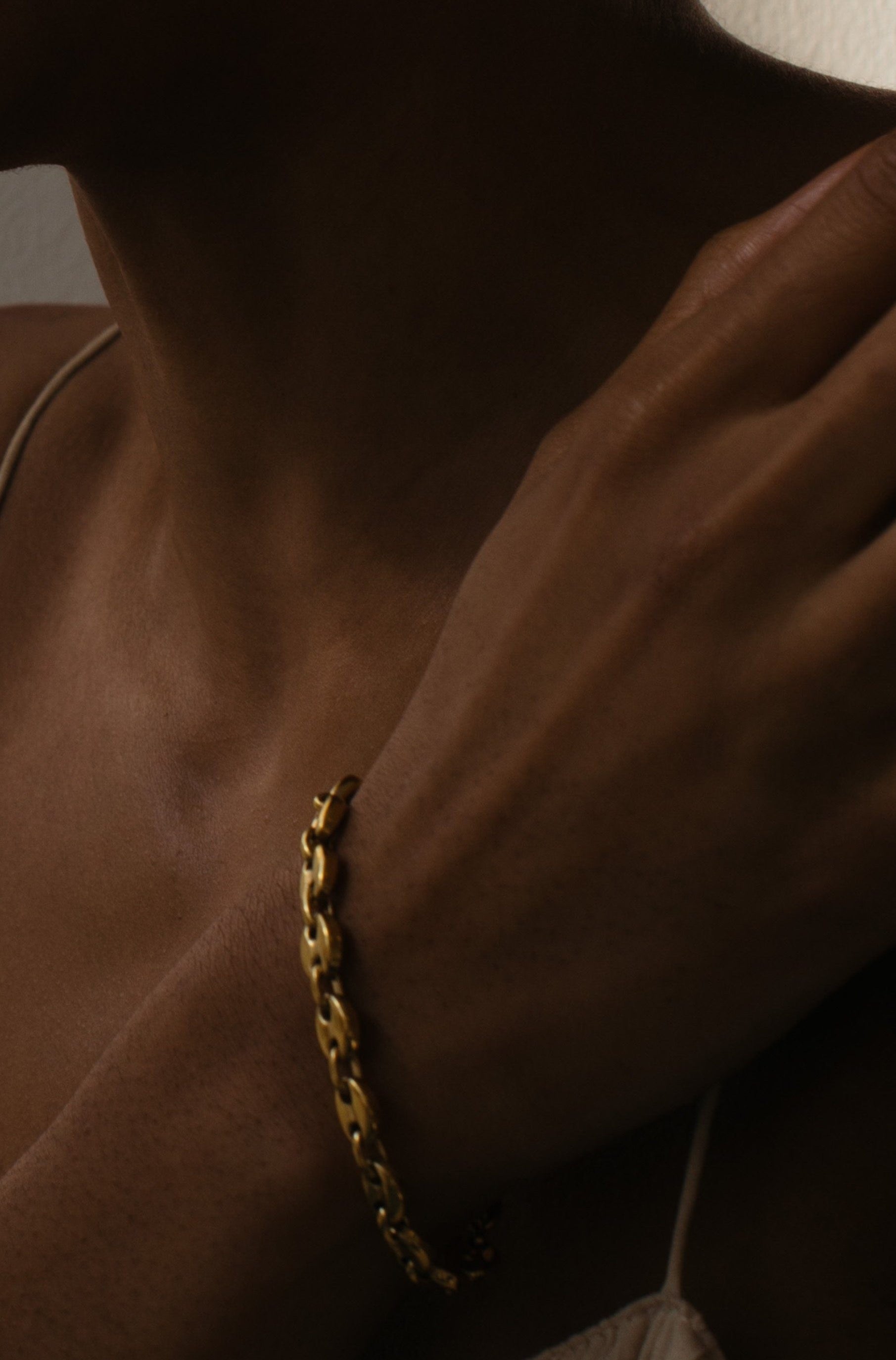 Model profile view wearing the Onia Bracelet Bracelet Bagatiba 